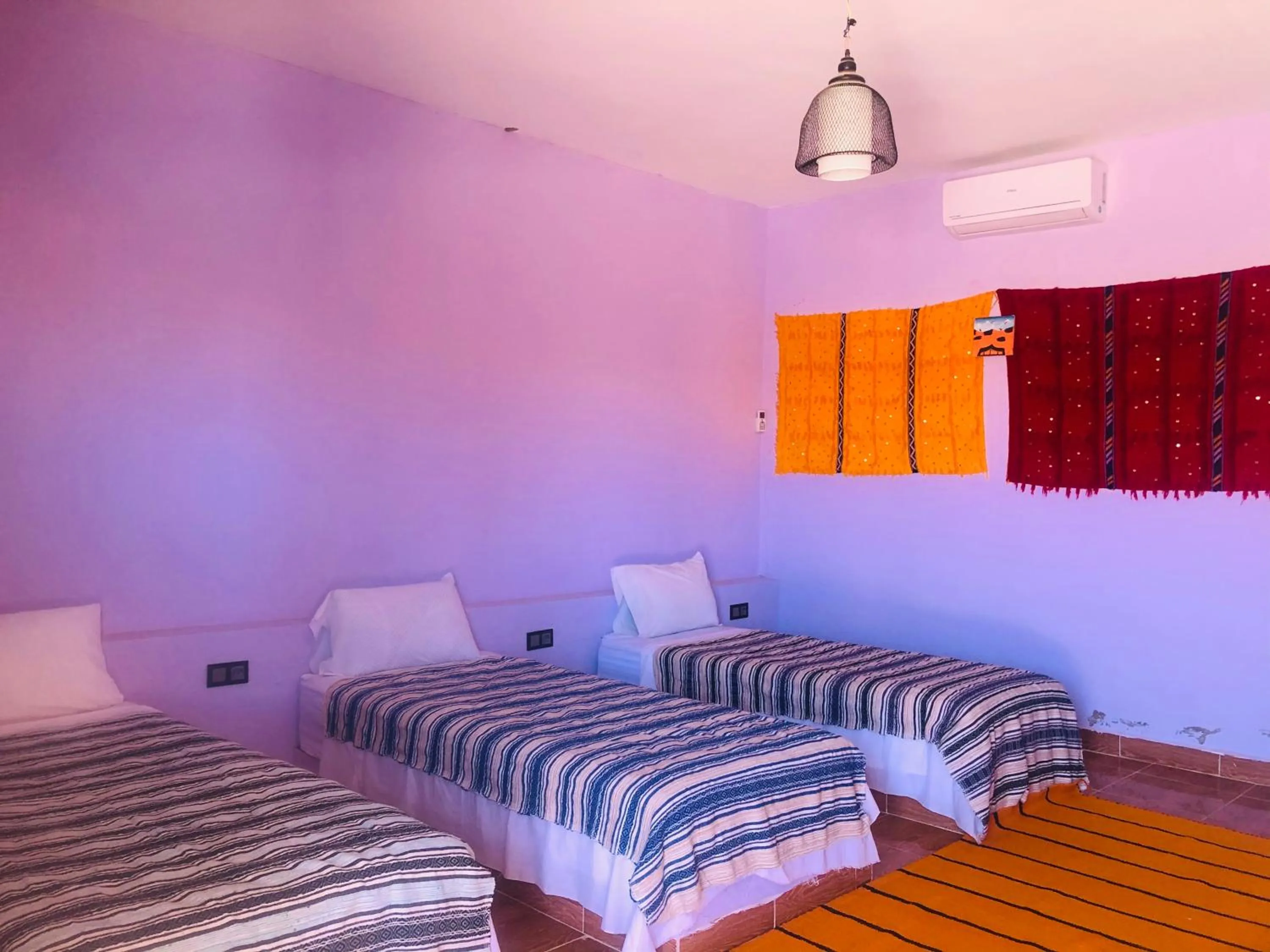 Bed in Riad Hotel Les Flamants