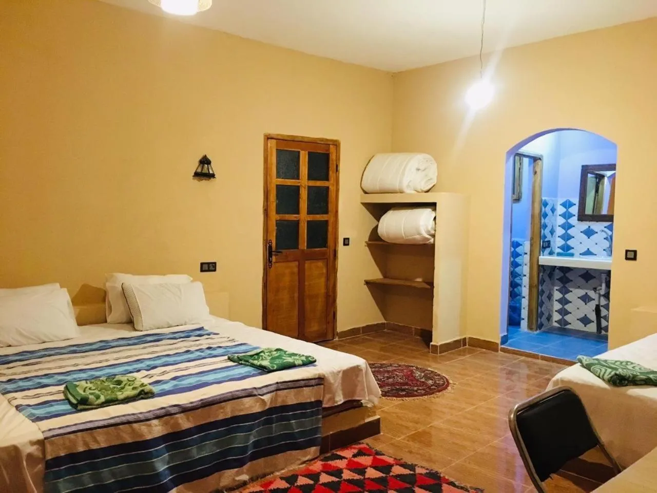 Bed in Riad Hotel Les Flamants