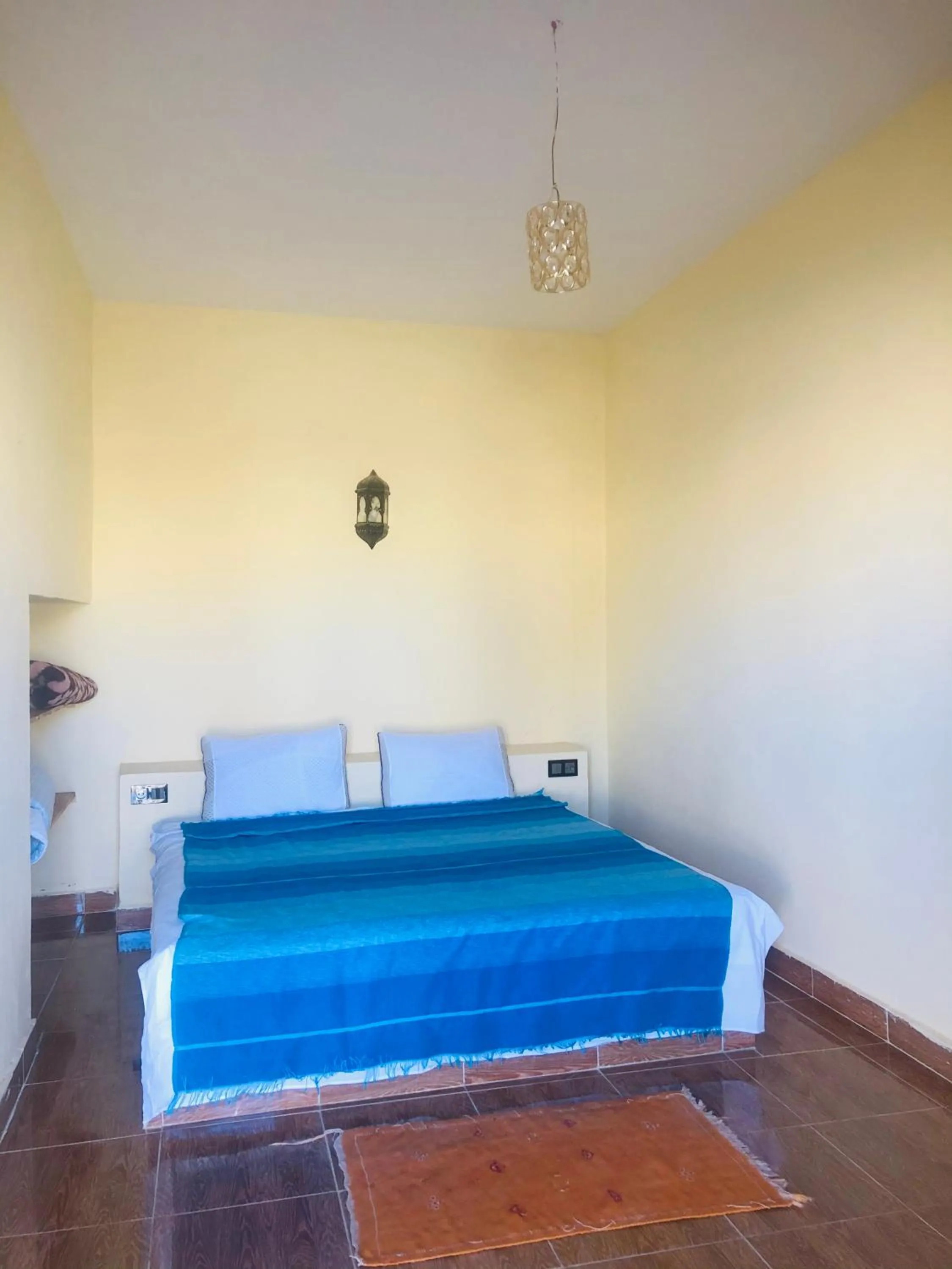 Bed in Riad Hotel Les Flamants