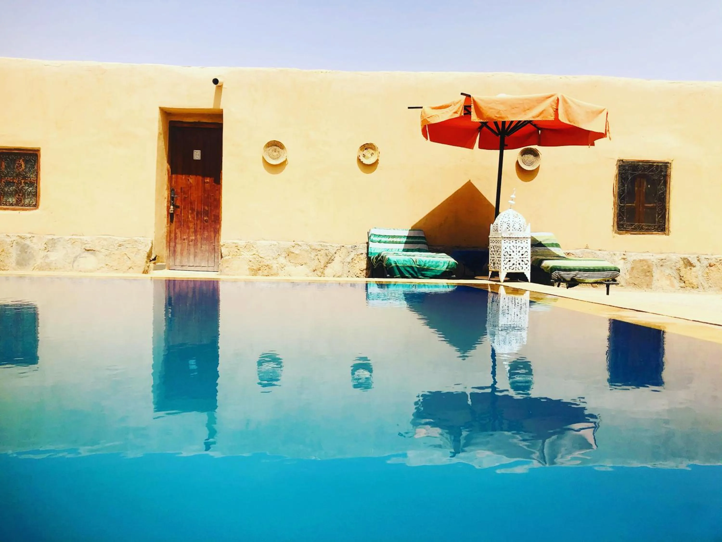 Swimming pool in Riad Hotel Les Flamants