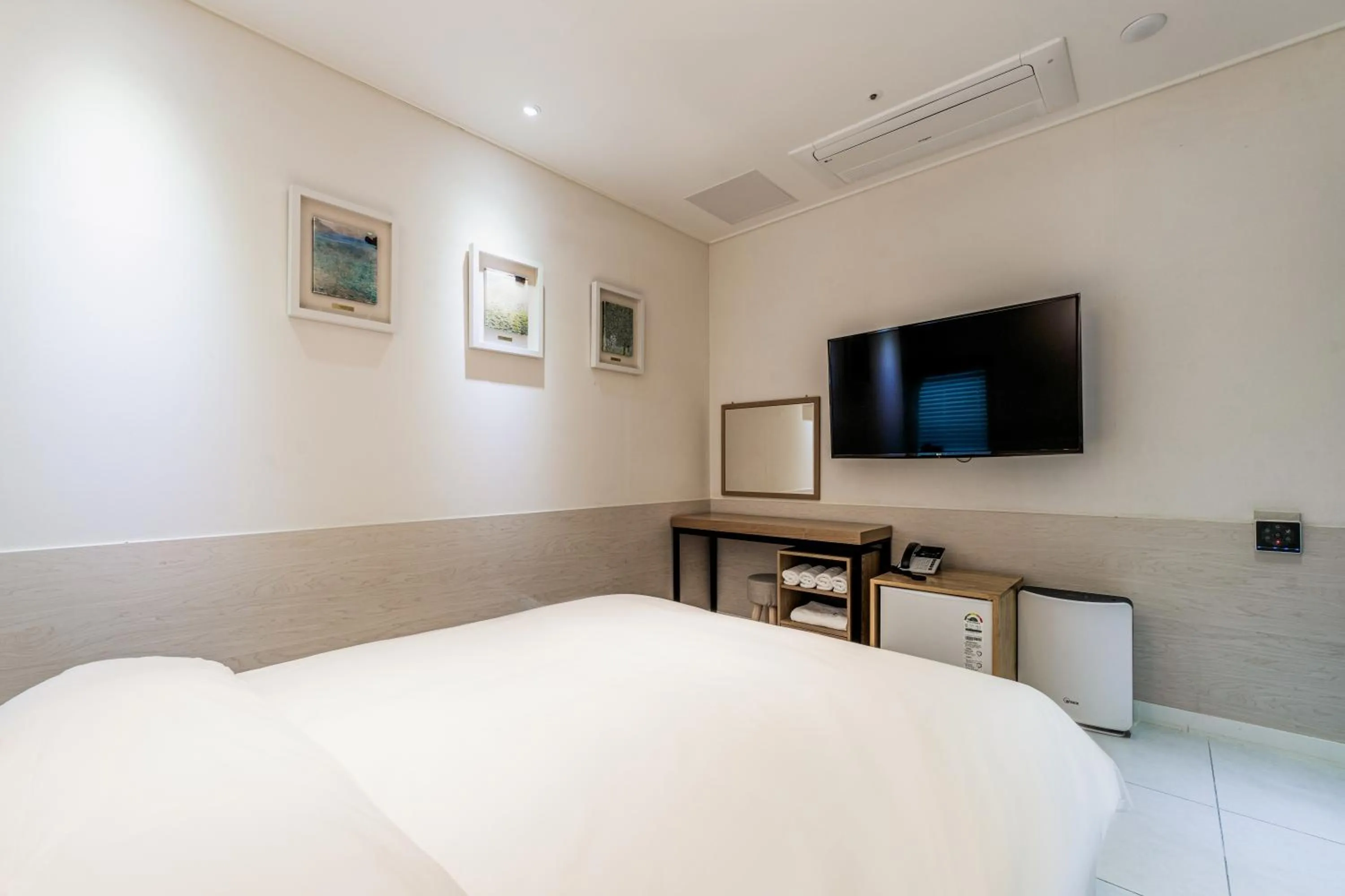 Bed in 오션스테이 호텔