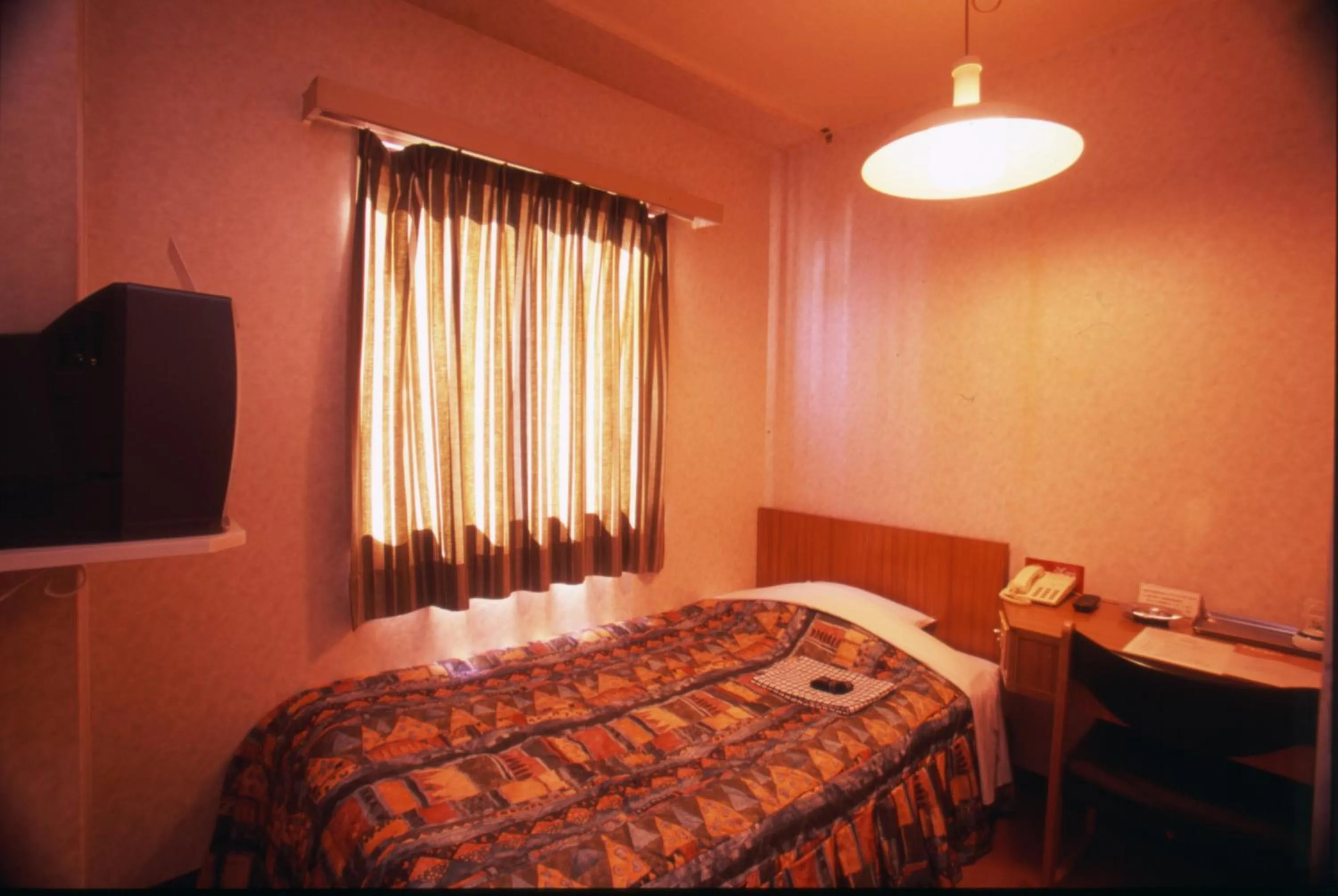 Bed in ホテルアークインてんねん