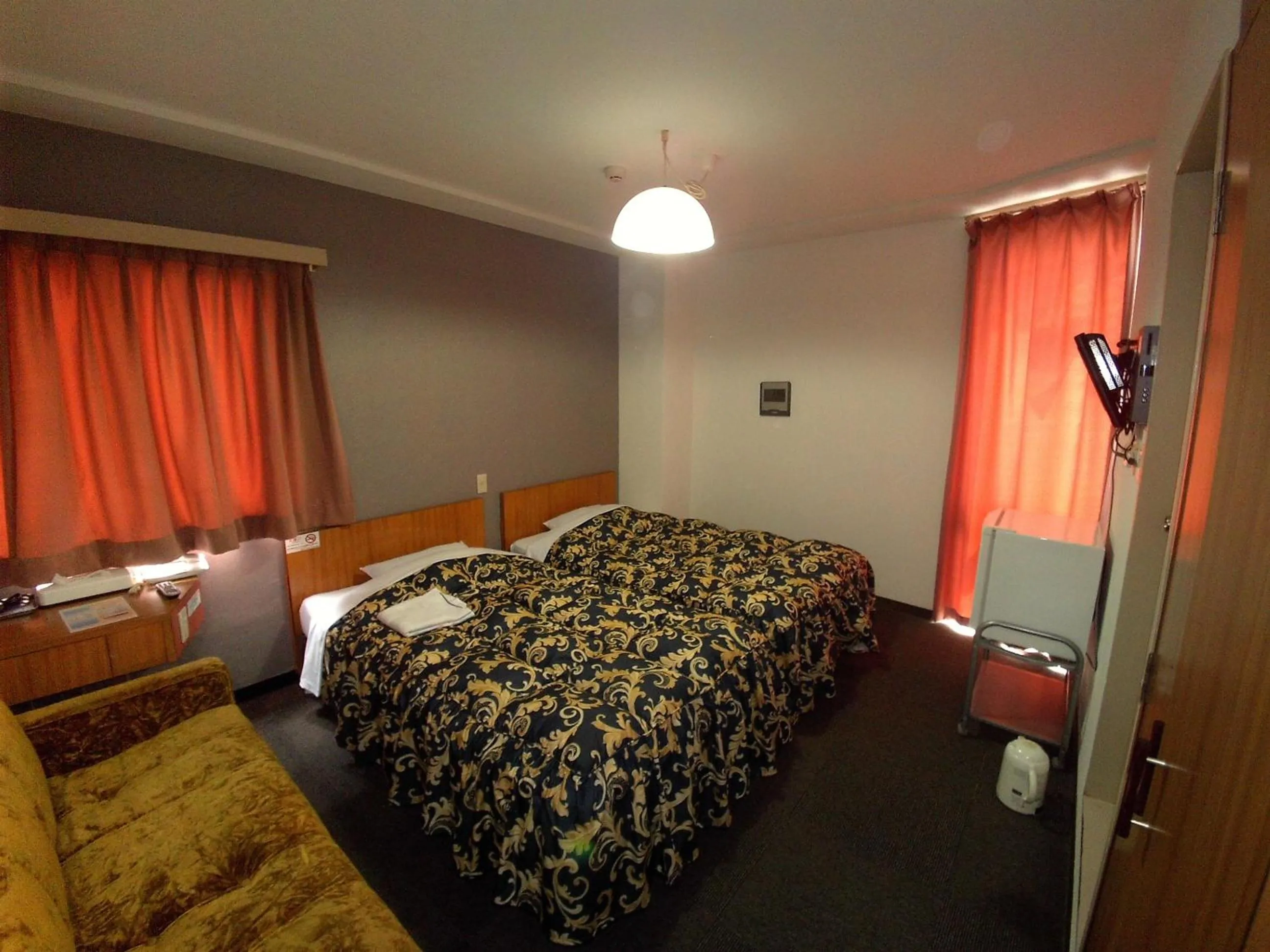 Bed in ホテルアークインてんねん