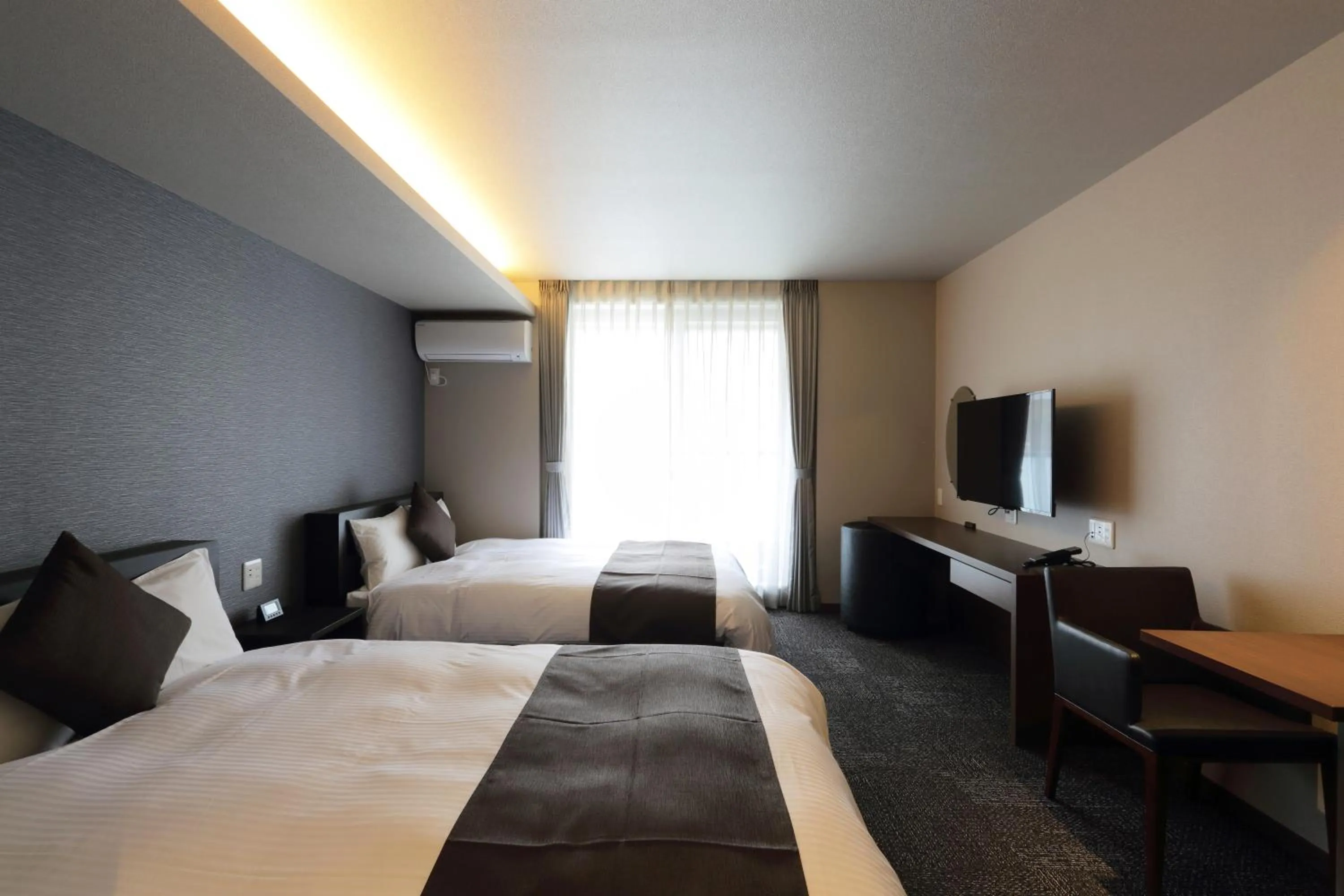 Bed in HOTEL PROMOTE HIROSHIMA