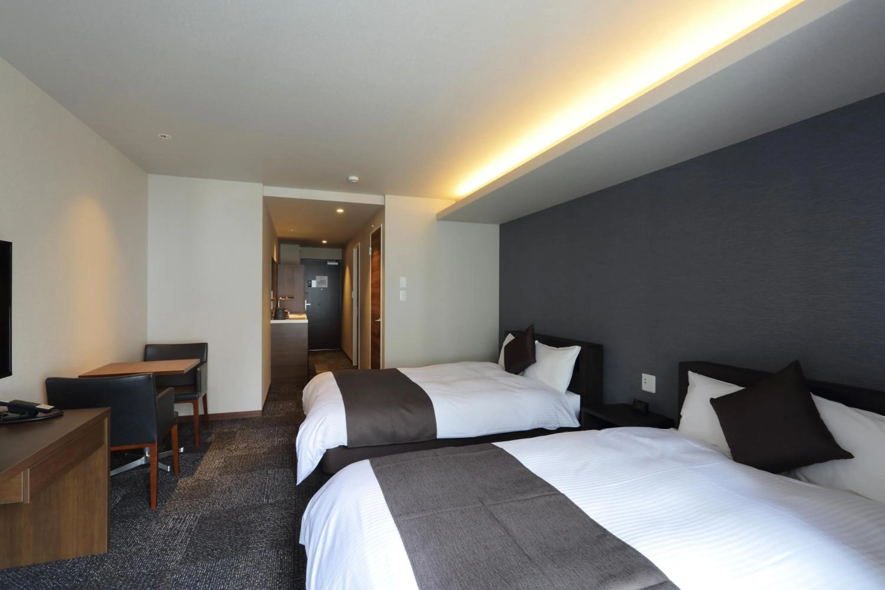 Bed in HOTEL PROMOTE HIROSHIMA