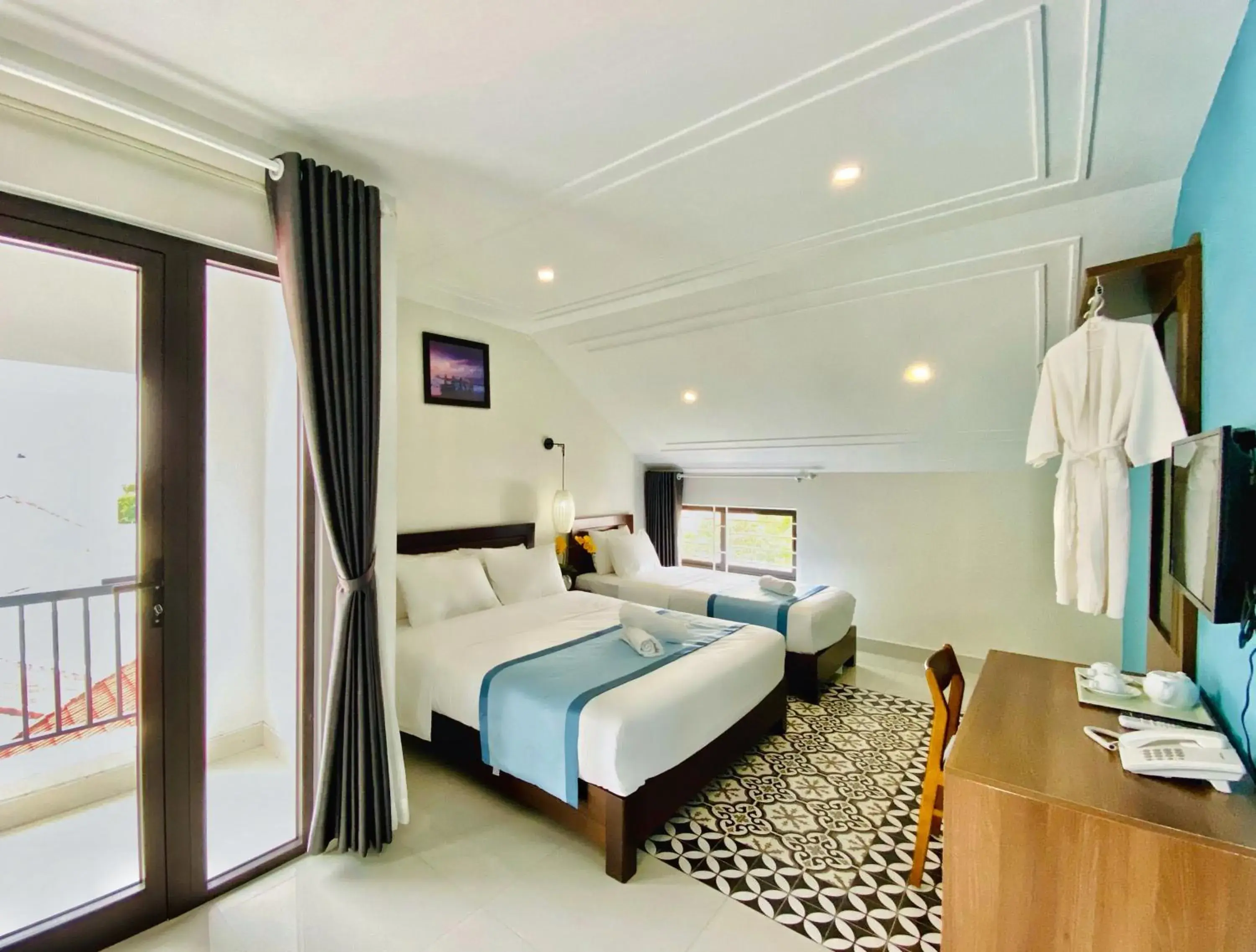 Deluxe Family Room in Grand Holiday Hoian Villa Deluxe Family Room in Grand Holiday Hoian Villa