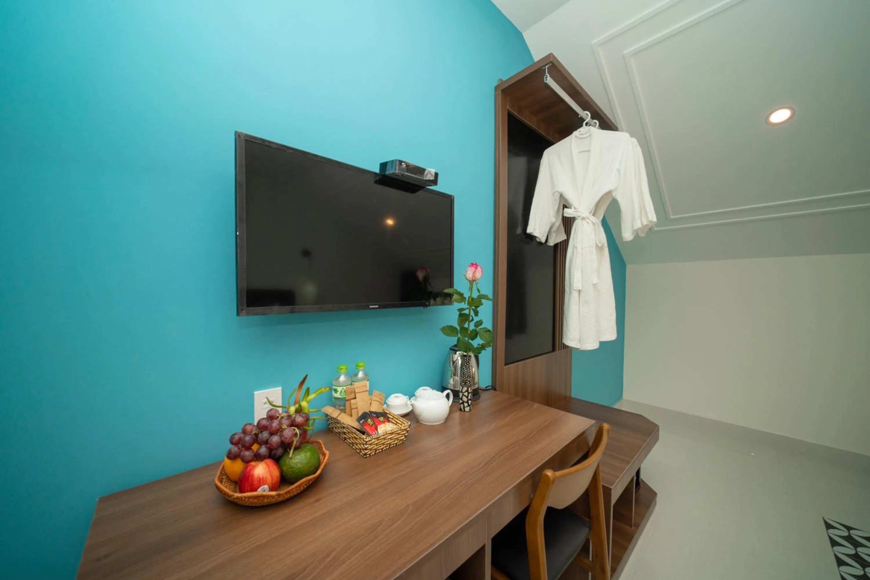 Communal lounge/ TV room in Grand Holiday Hoian Villa