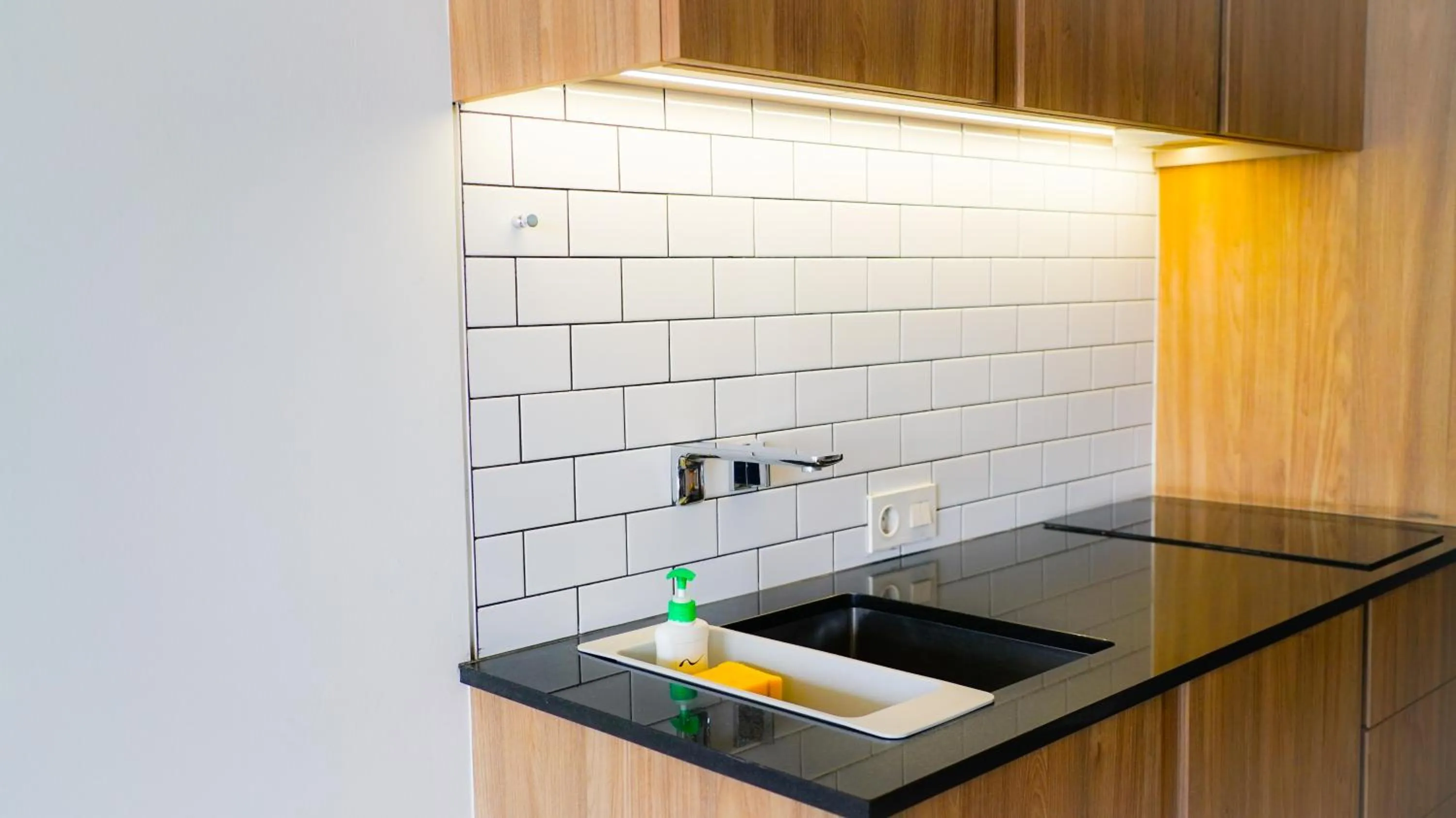 Kitchen or kitchenette in Nagomi Suites & Hotel