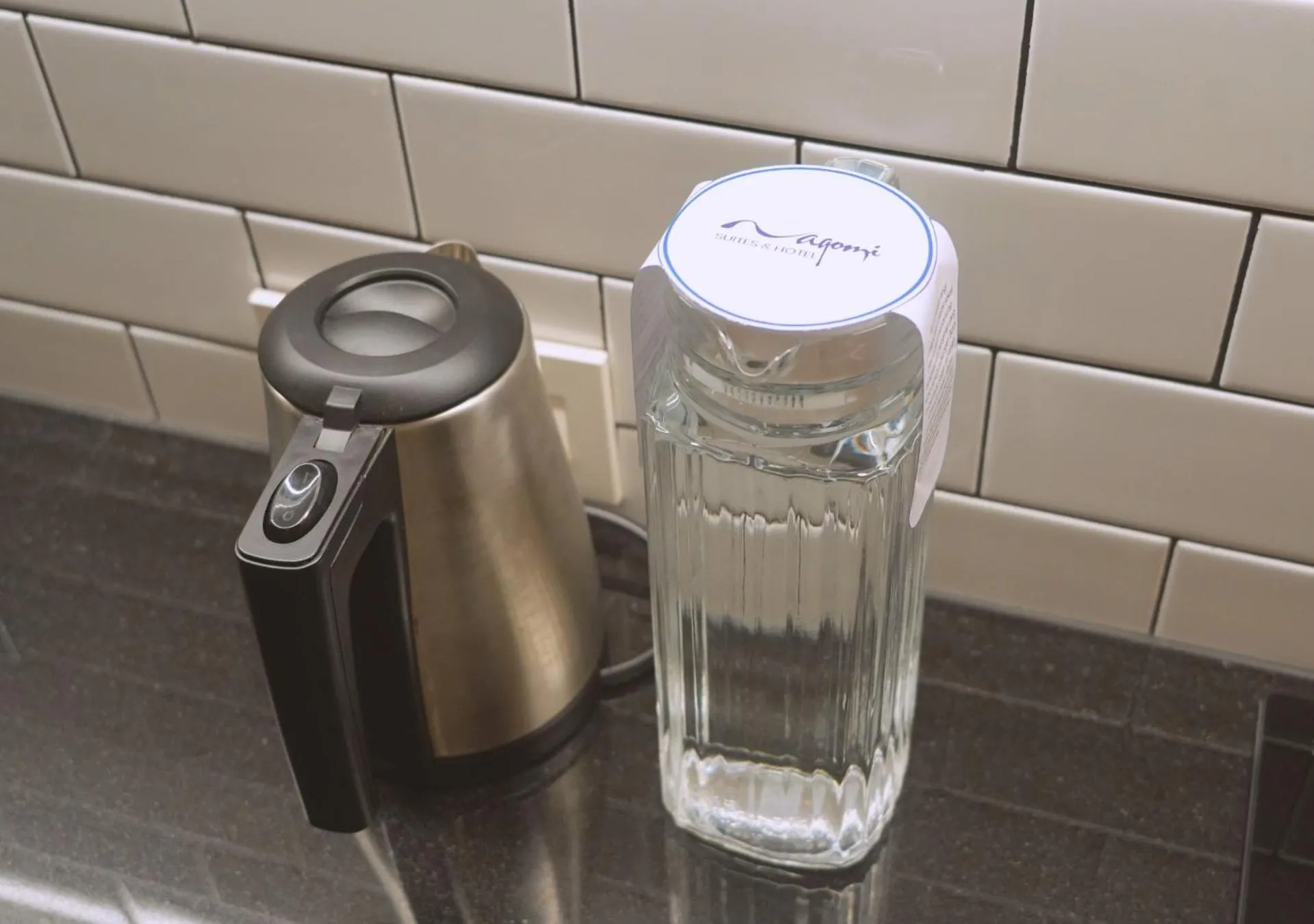 Kitchen or kitchenette in Nagomi Suites & Hotel