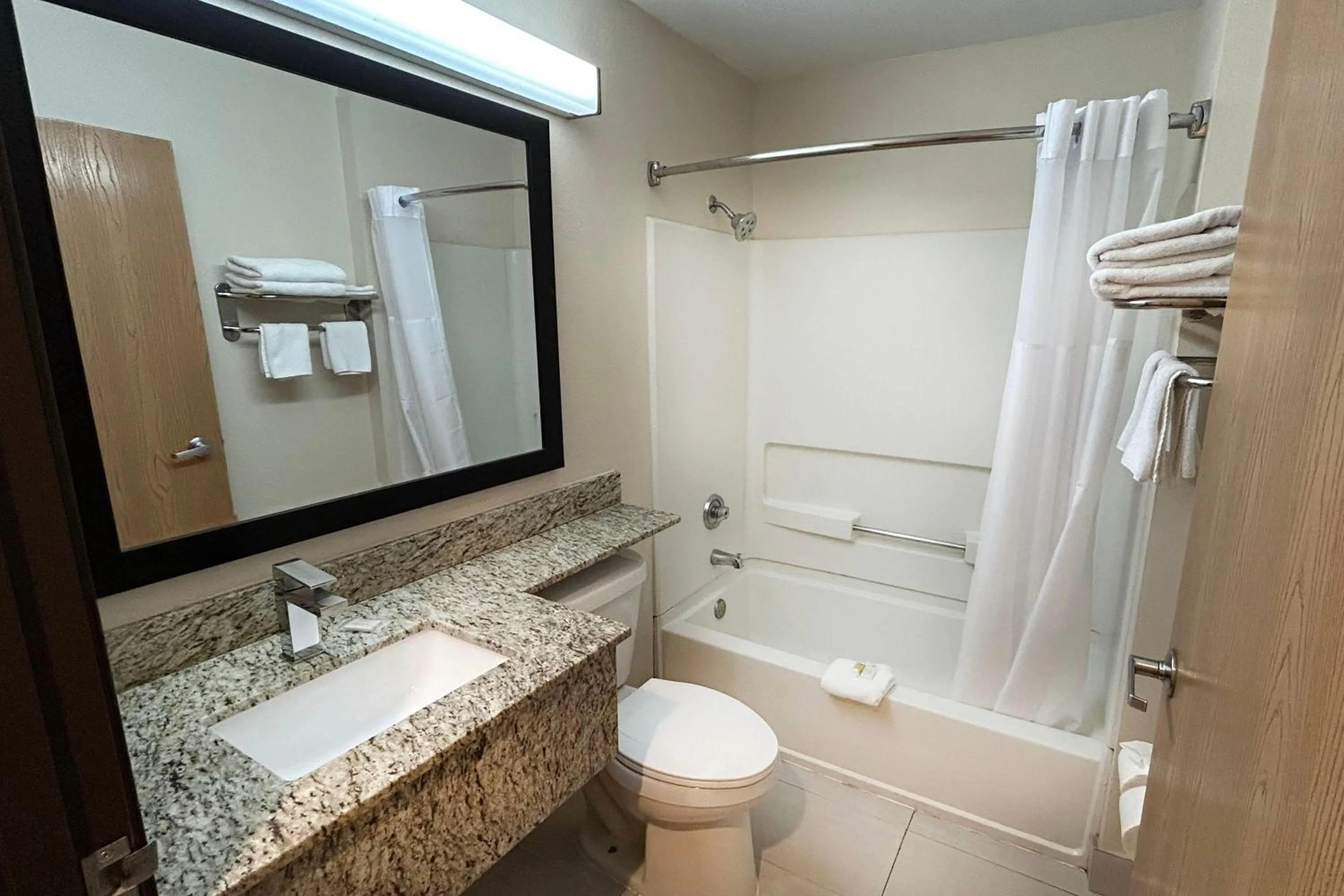 Bathroom in Travelodge by Wyndham Arlington/Dallas Area