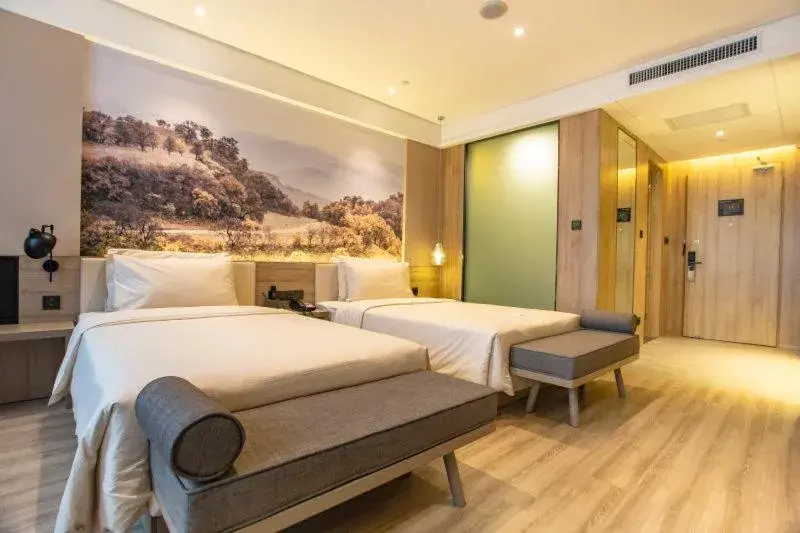 Bed in Atour Hotel Xi'an Gaoxin Jinye Road Branch Bed in Atour Hotel Xi'an Gaoxin Jinye Road Branch