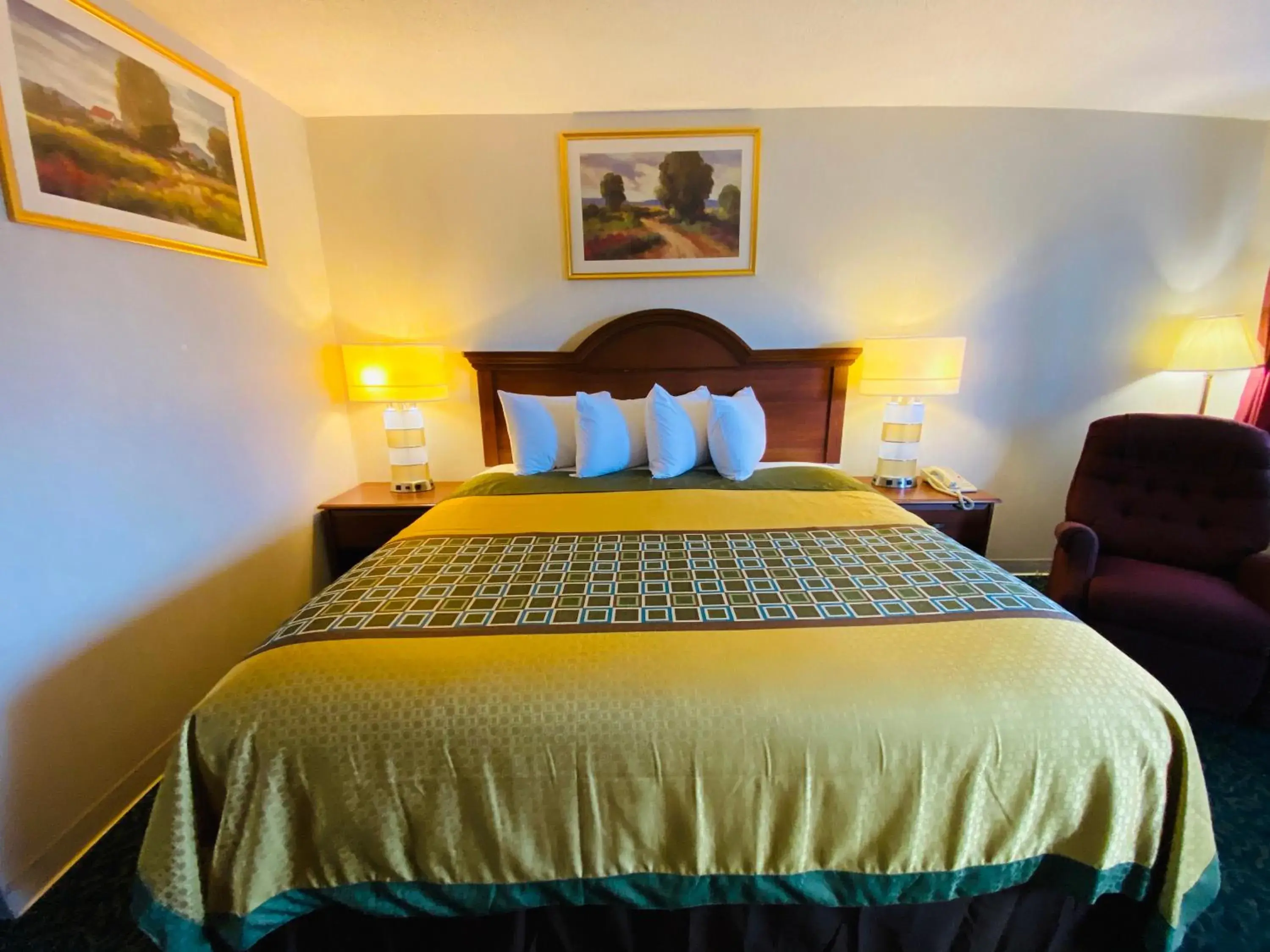 Bed in Harrisonville Inn & Suites Bed in Harrisonville Inn & Suites