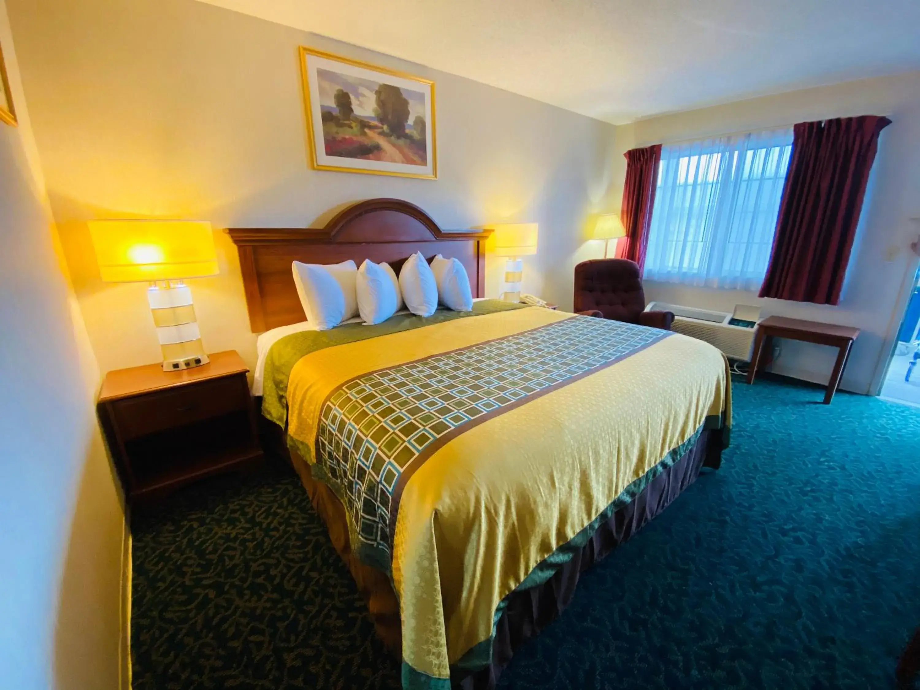 Bed in Harrisonville Inn & Suites Bed in Harrisonville Inn & Suites