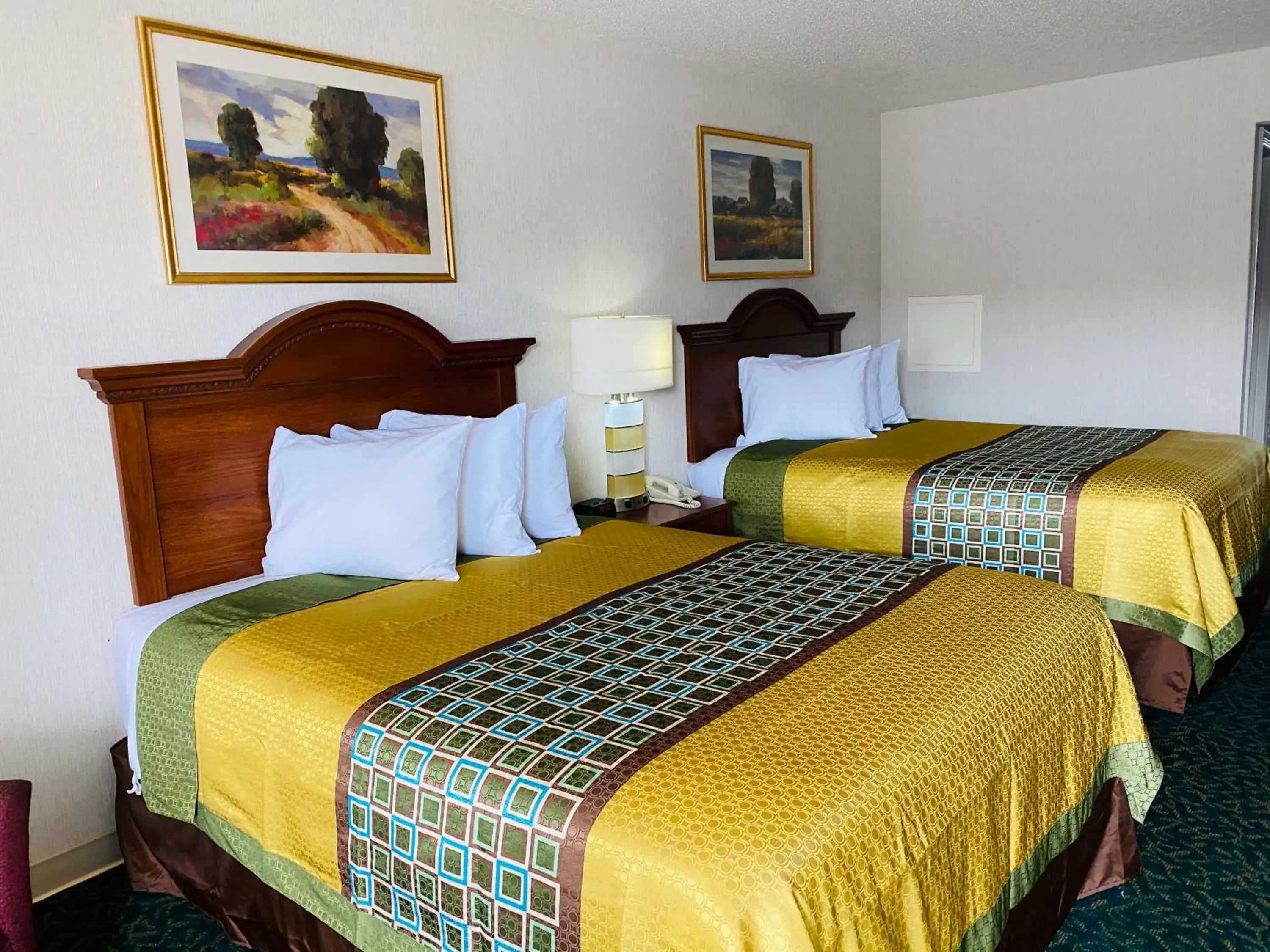 Bed in Harrisonville Inn & Suites Bed in Harrisonville Inn & Suites