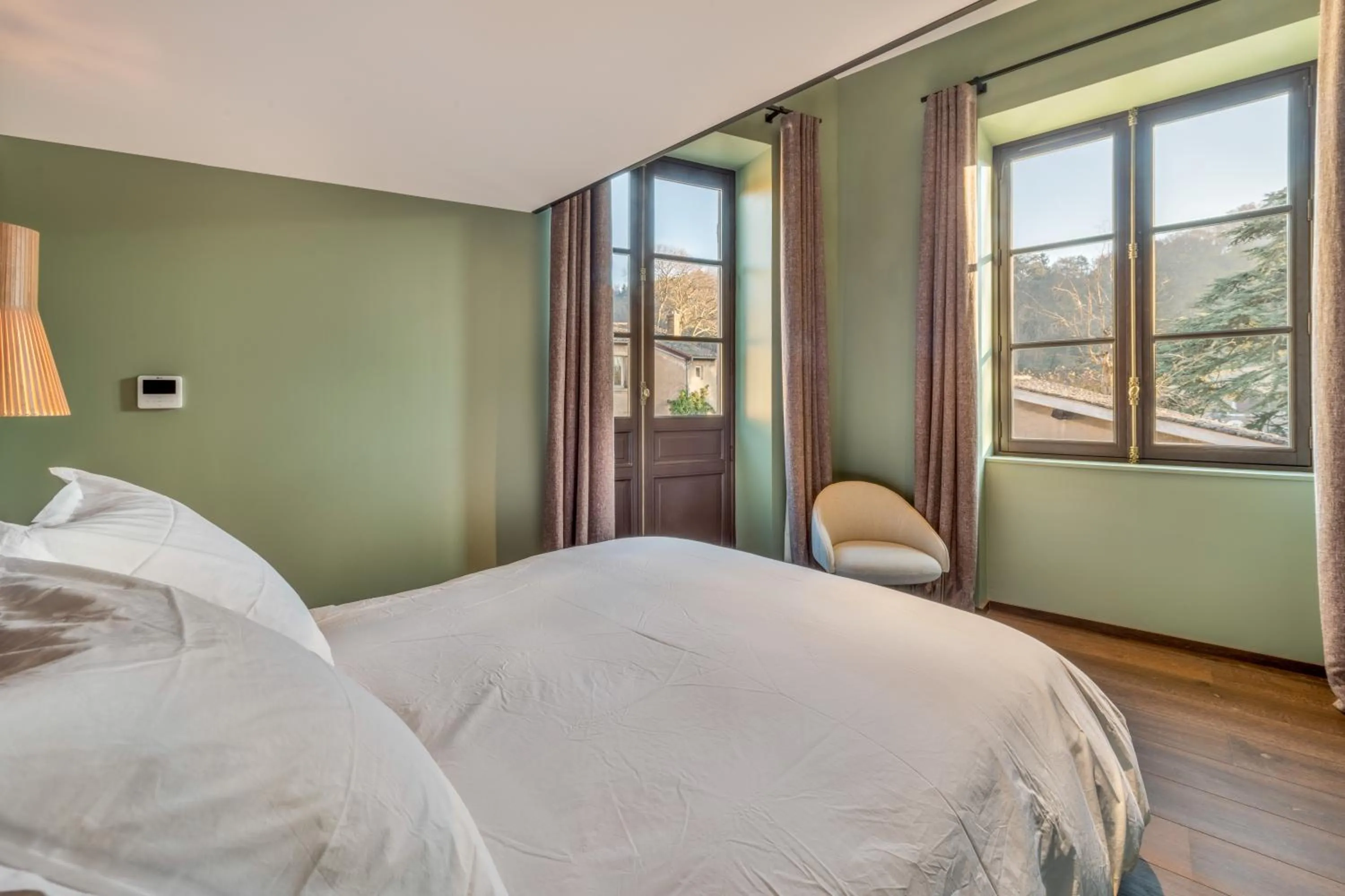 Bed in Les Suites de l'Ile Barbe