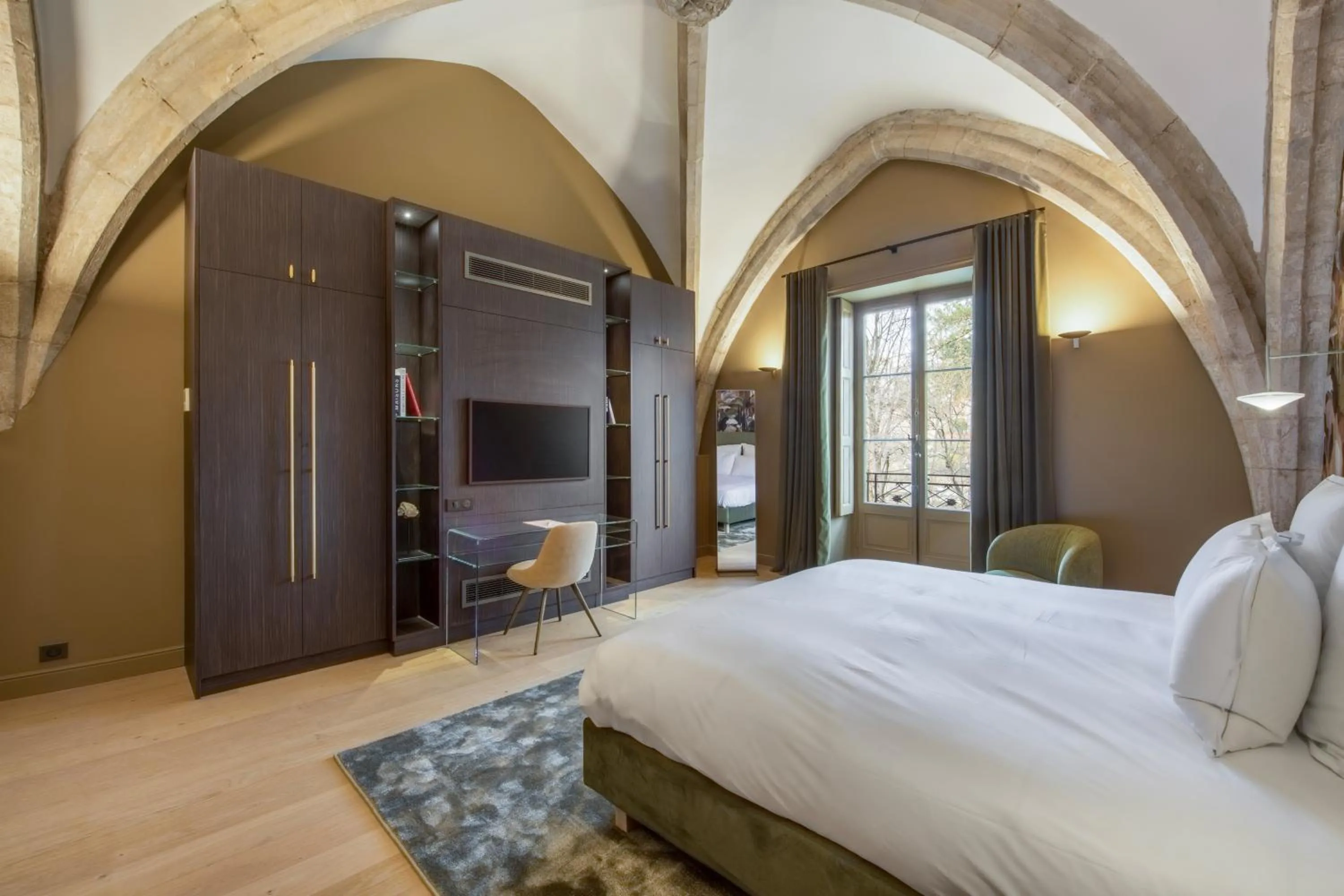 Bed in Les Suites de l'Ile Barbe