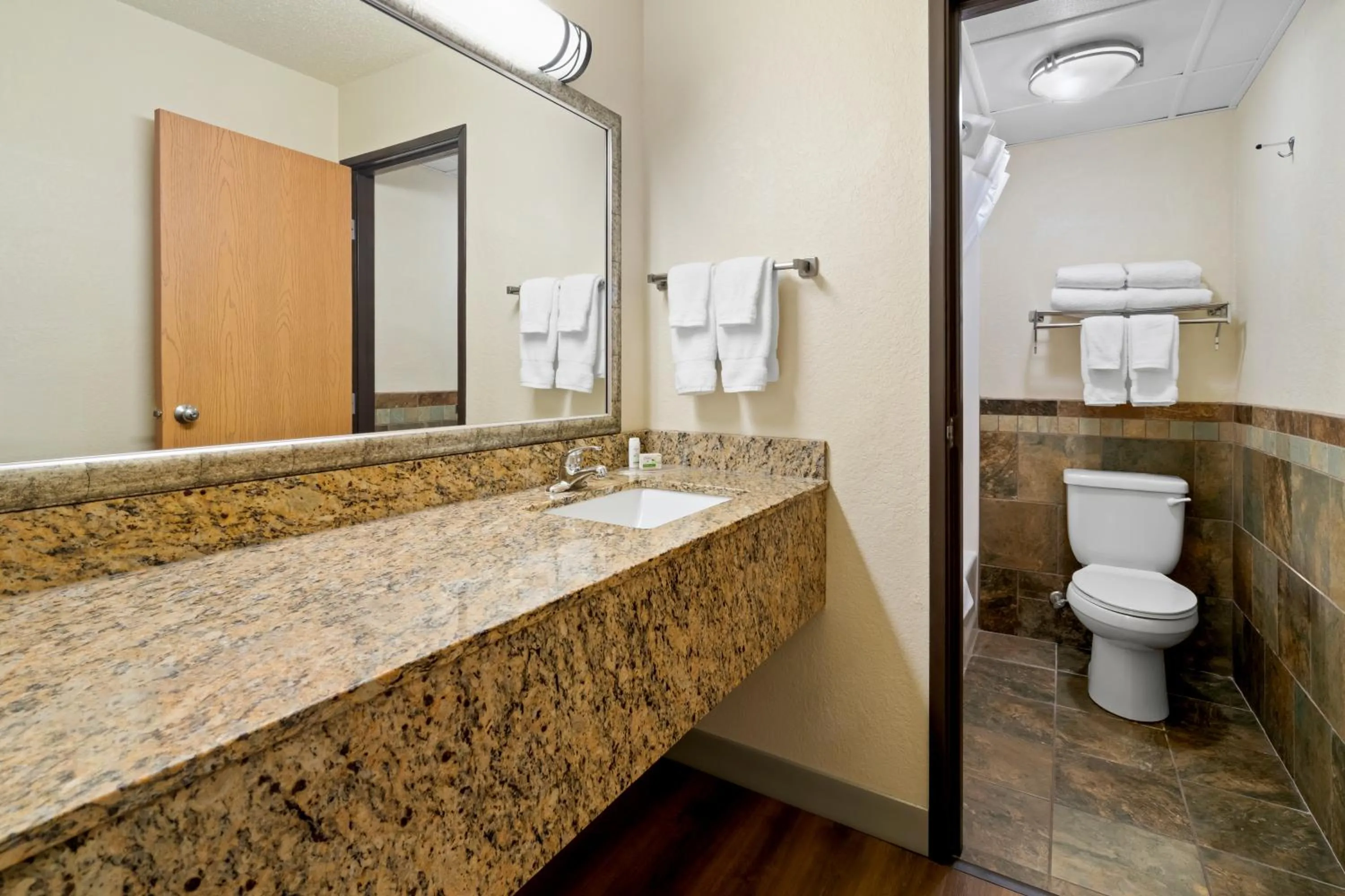 Bathroom in AmericInn by Wyndham Dickinson