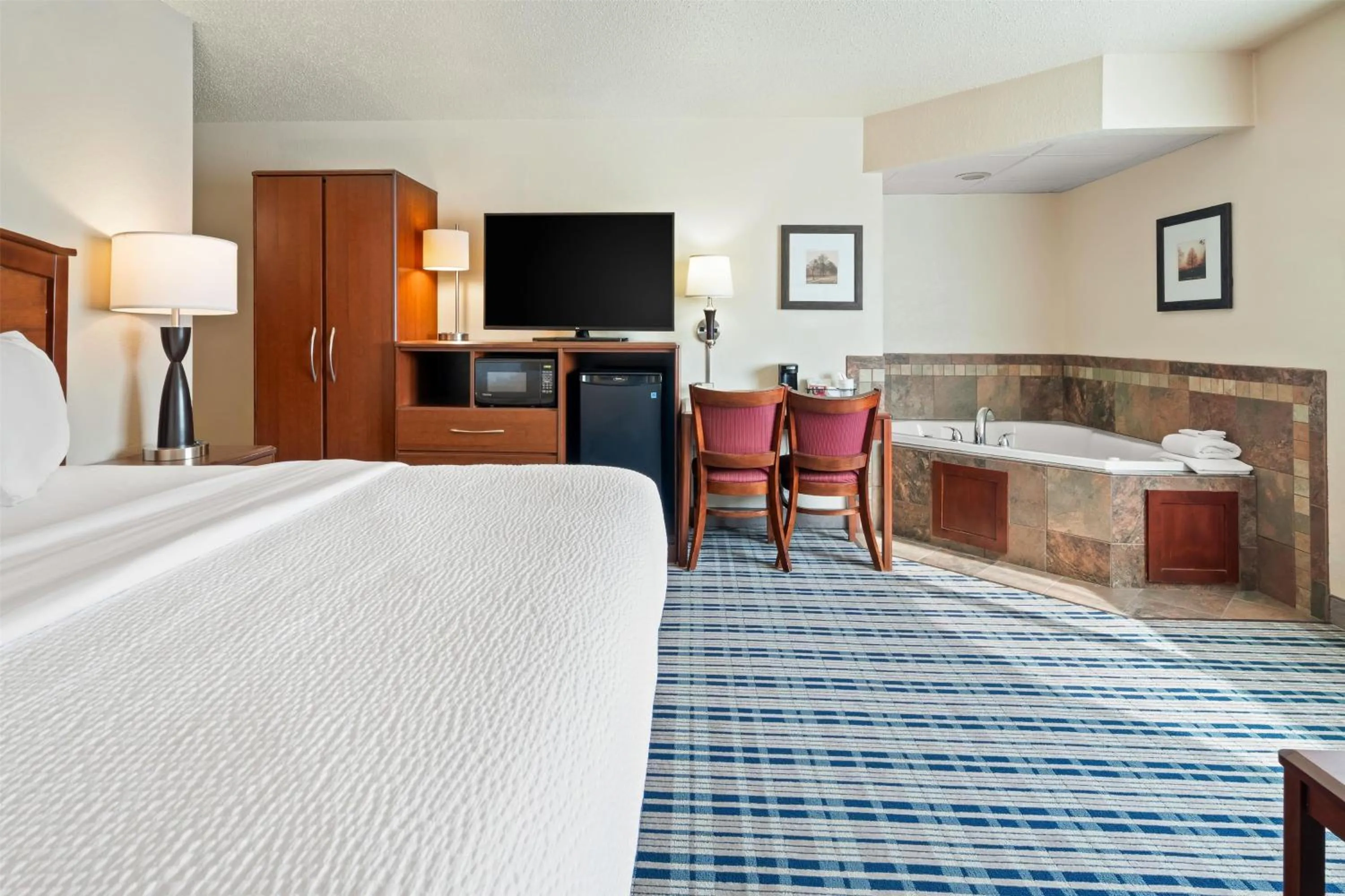 Photo of the whole room, Bed in AmericInn by Wyndham Dickinson