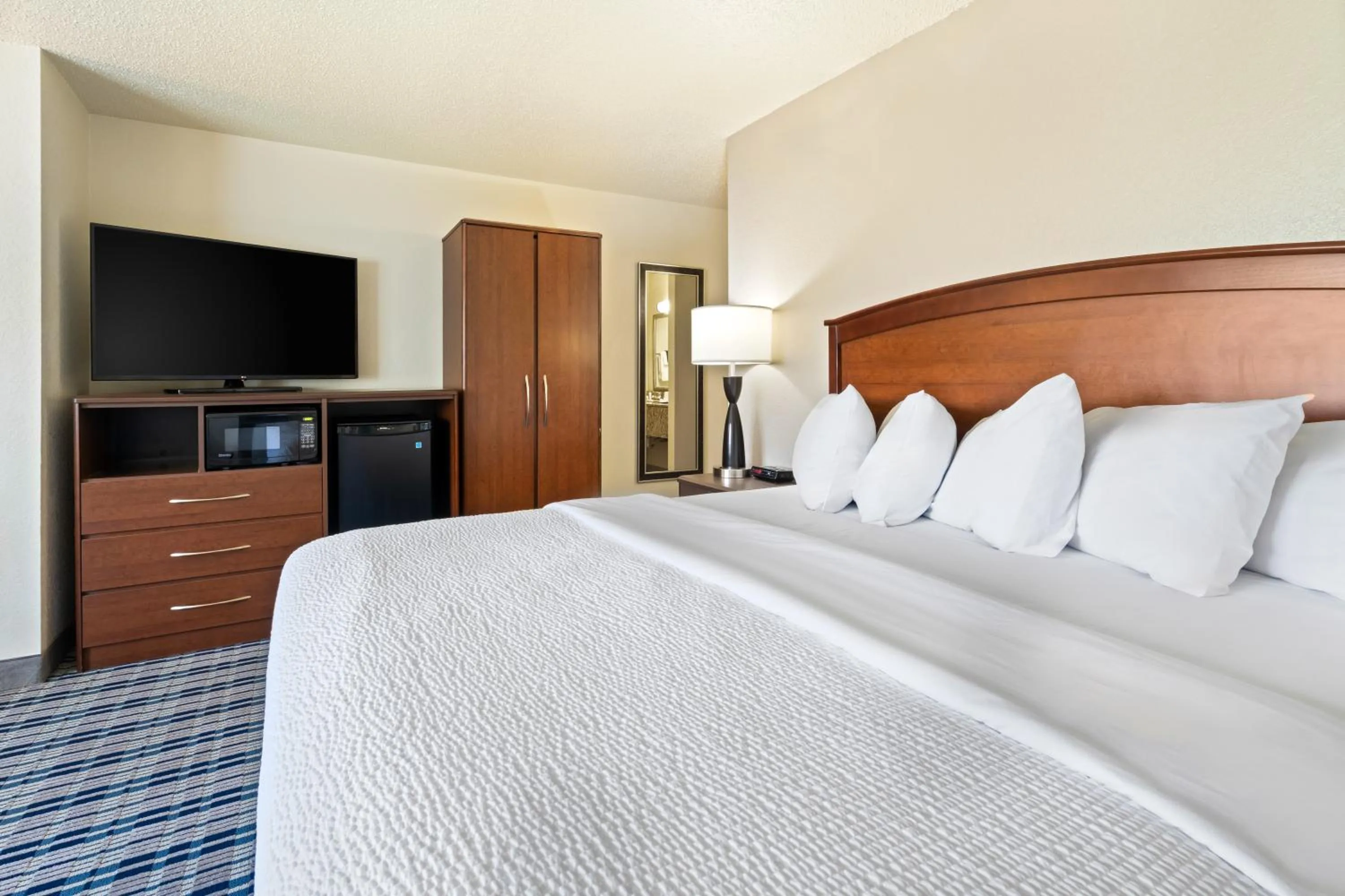 Photo of the whole room, Bed in AmericInn by Wyndham Dickinson