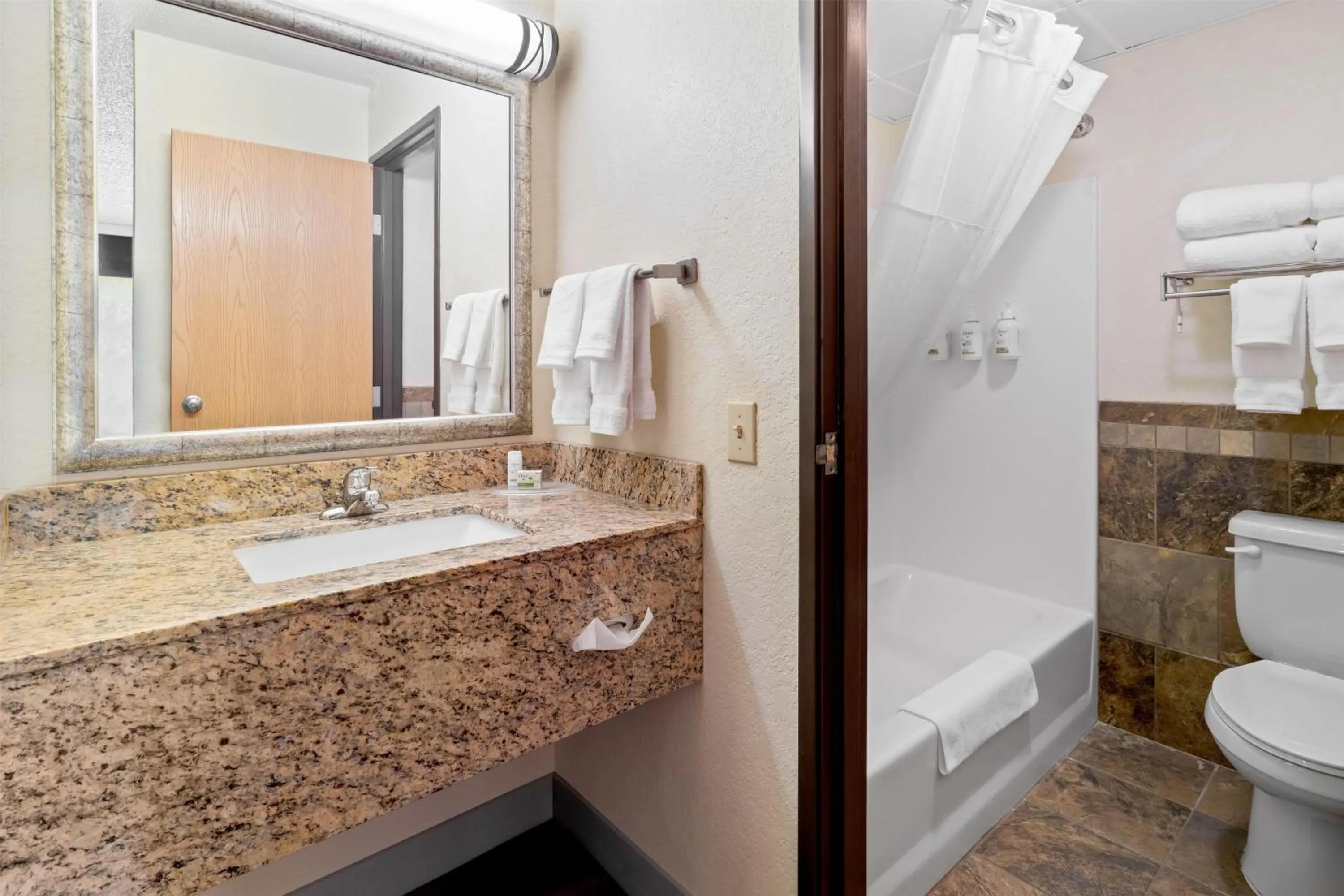 Bathroom in AmericInn by Wyndham Dickinson