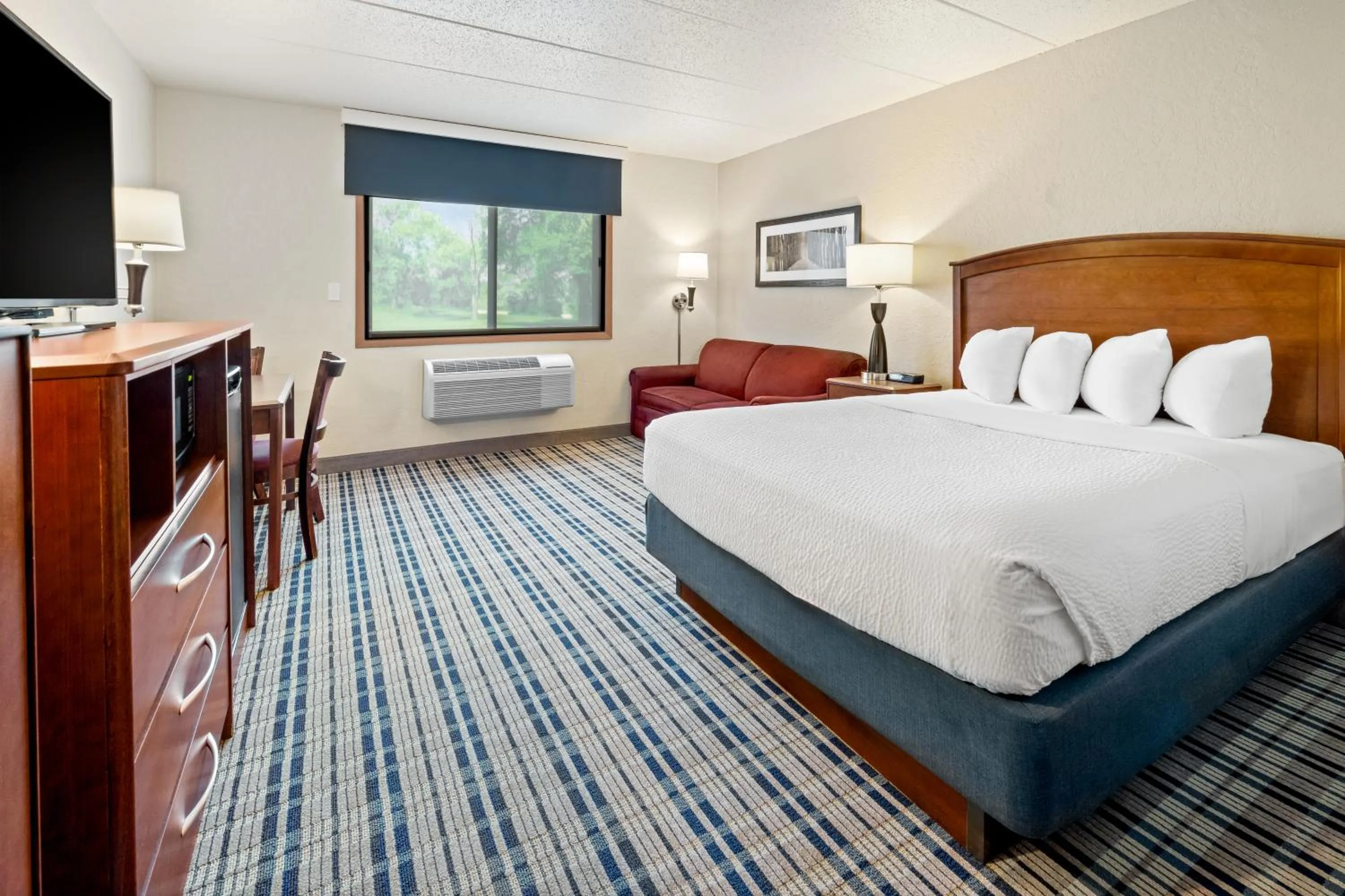 Photo of the whole room, Bed in AmericInn by Wyndham Dickinson