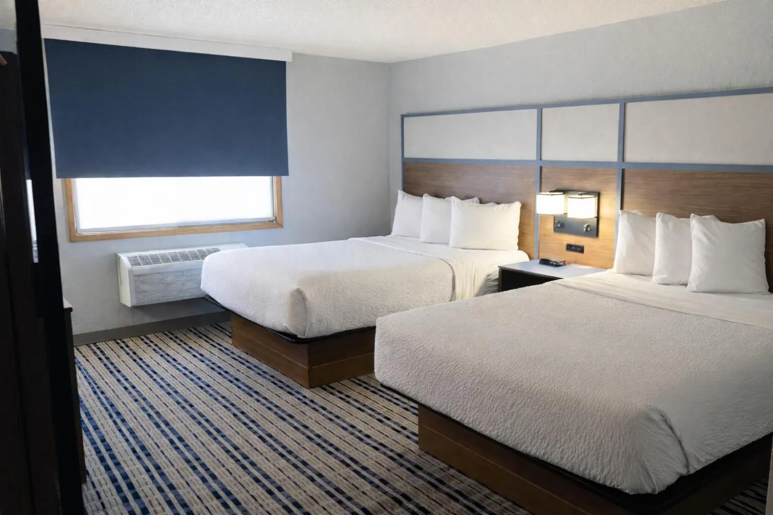 Photo of the whole room, Bed in AmericInn by Wyndham Dickinson