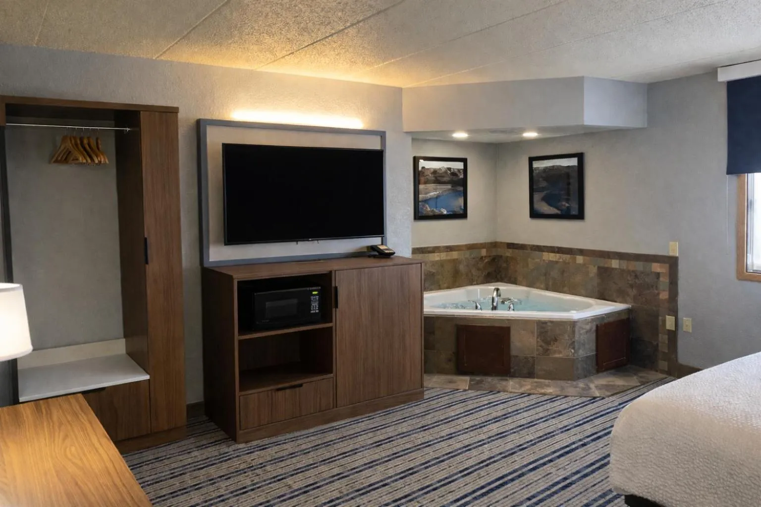 Photo of the whole room, Bed in AmericInn by Wyndham Dickinson