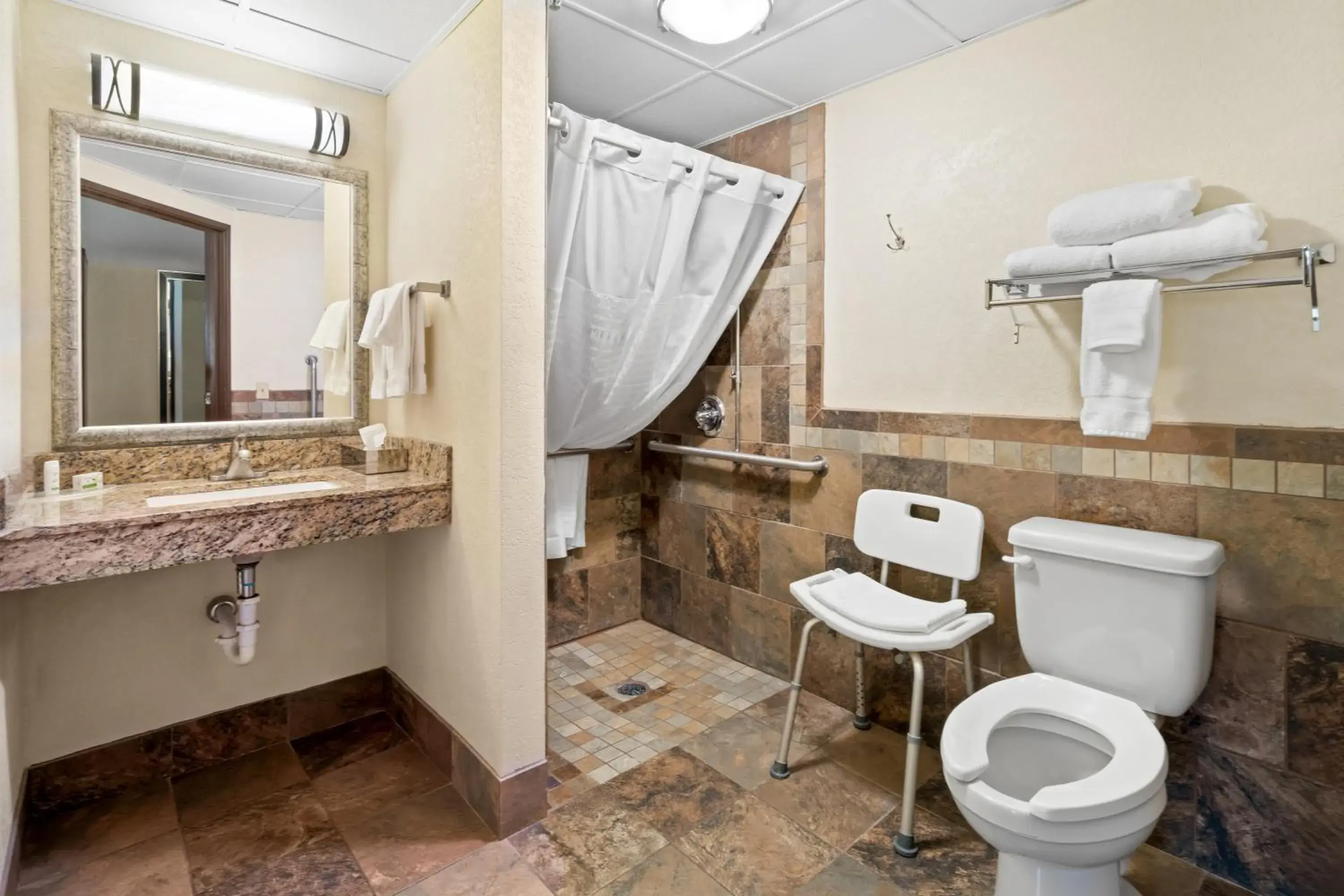 Bathroom in AmericInn by Wyndham Dickinson Bathroom in AmericInn by Wyndham Dickinson