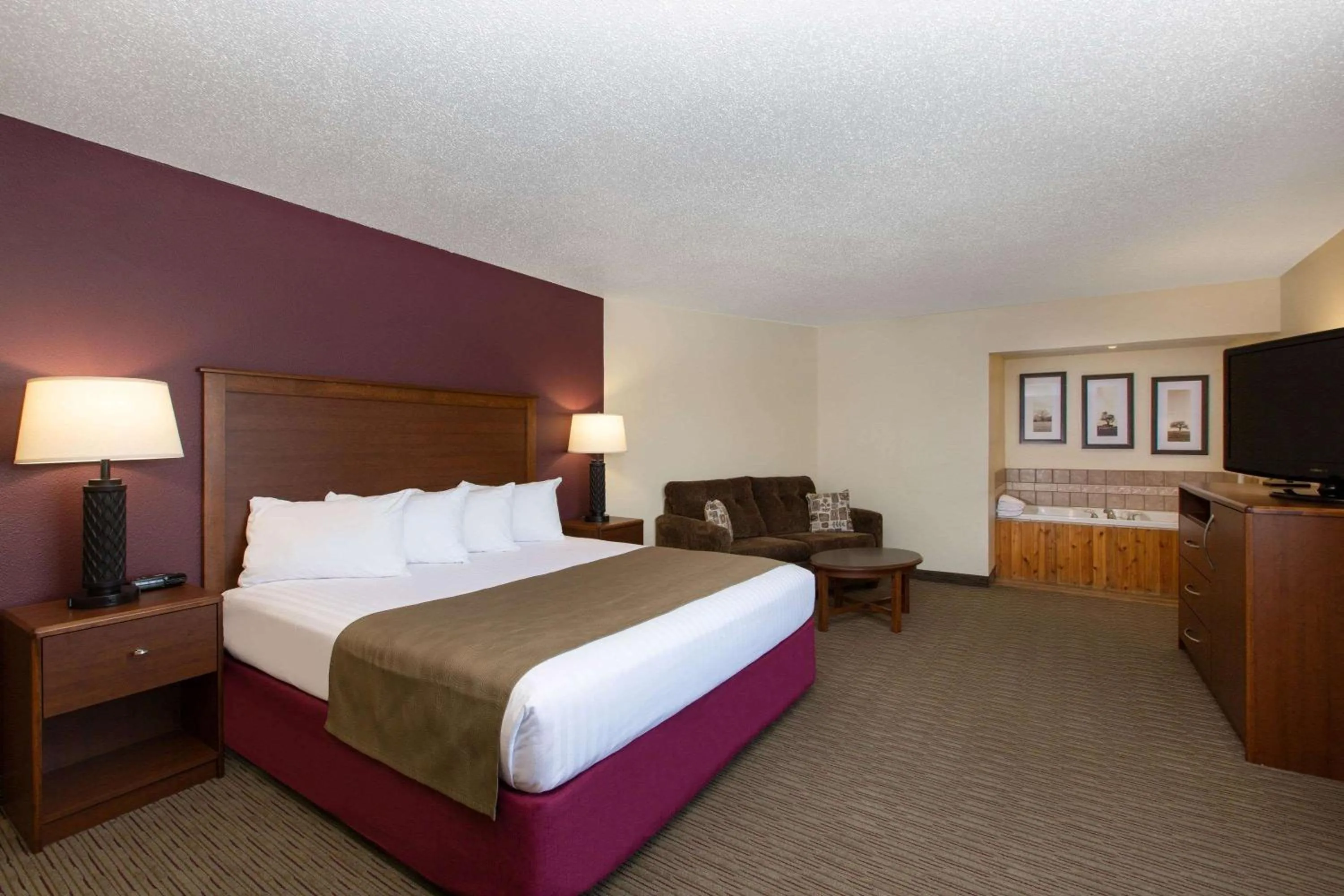 Photo of the whole room, Bed in AmericInn by Wyndham Merrill
