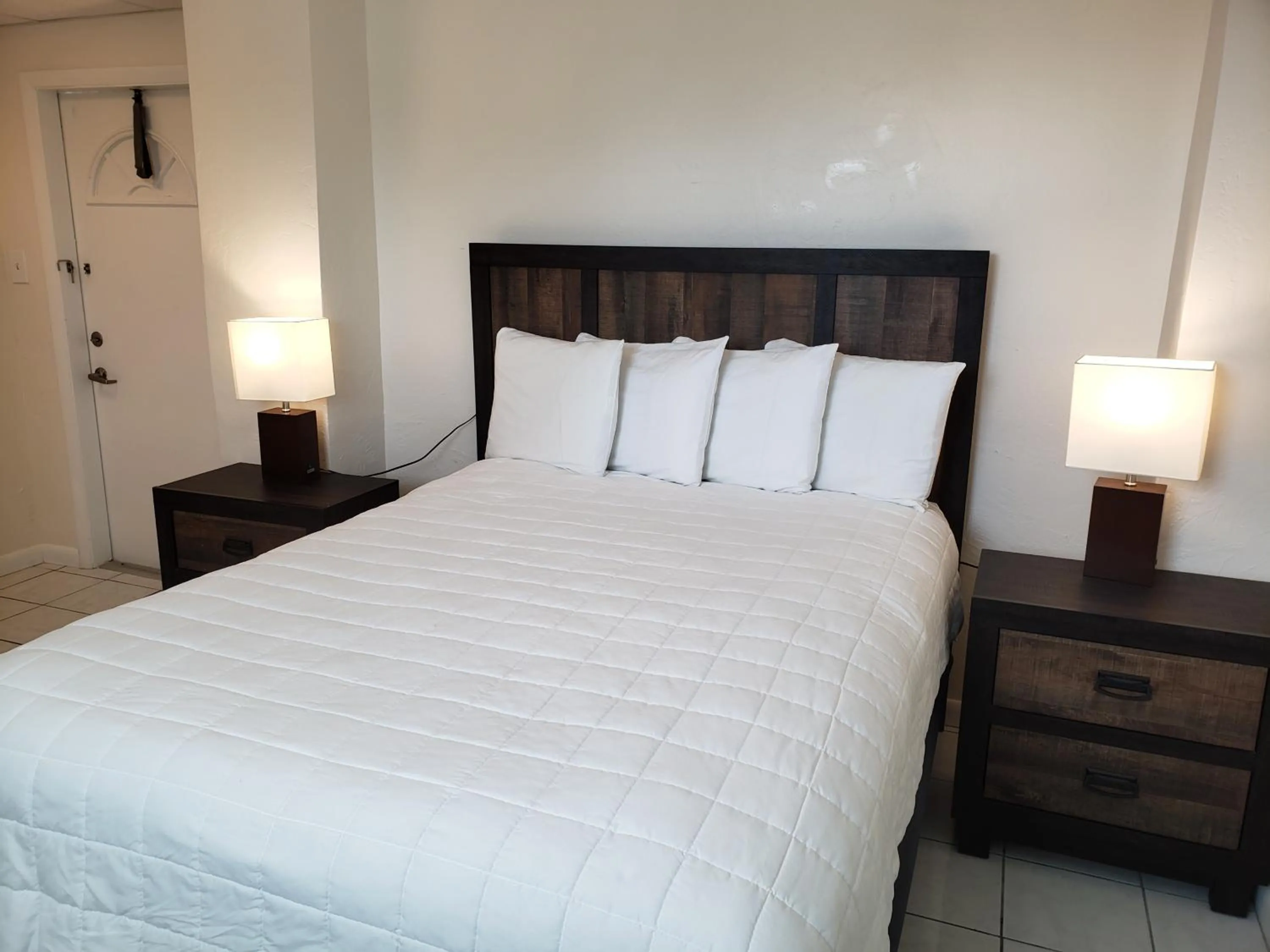 Bed in Parmer's Resort