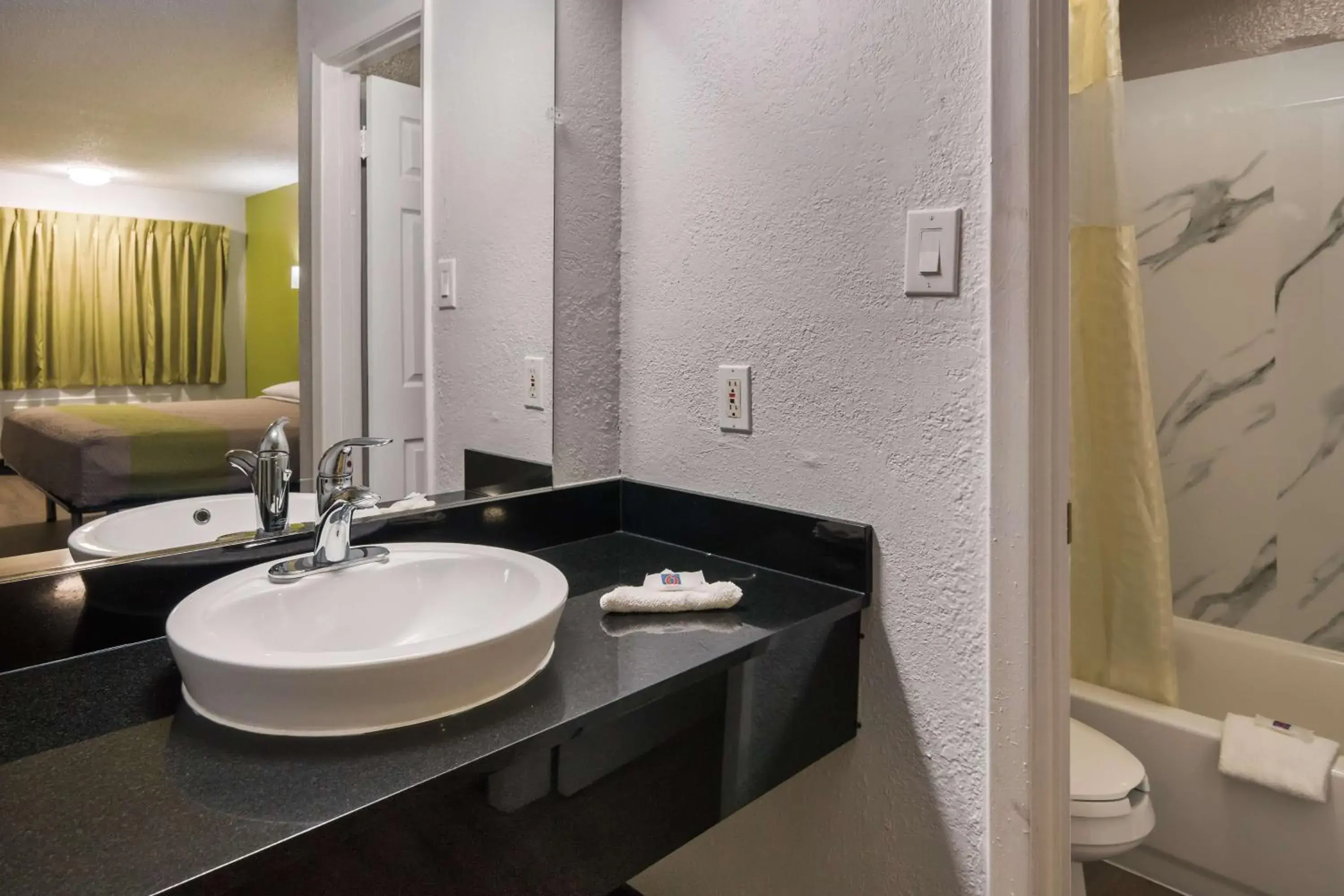 Bathroom in Motel 6 Irving - Loop 12 Bathroom in Motel 6 Irving - Loop 12