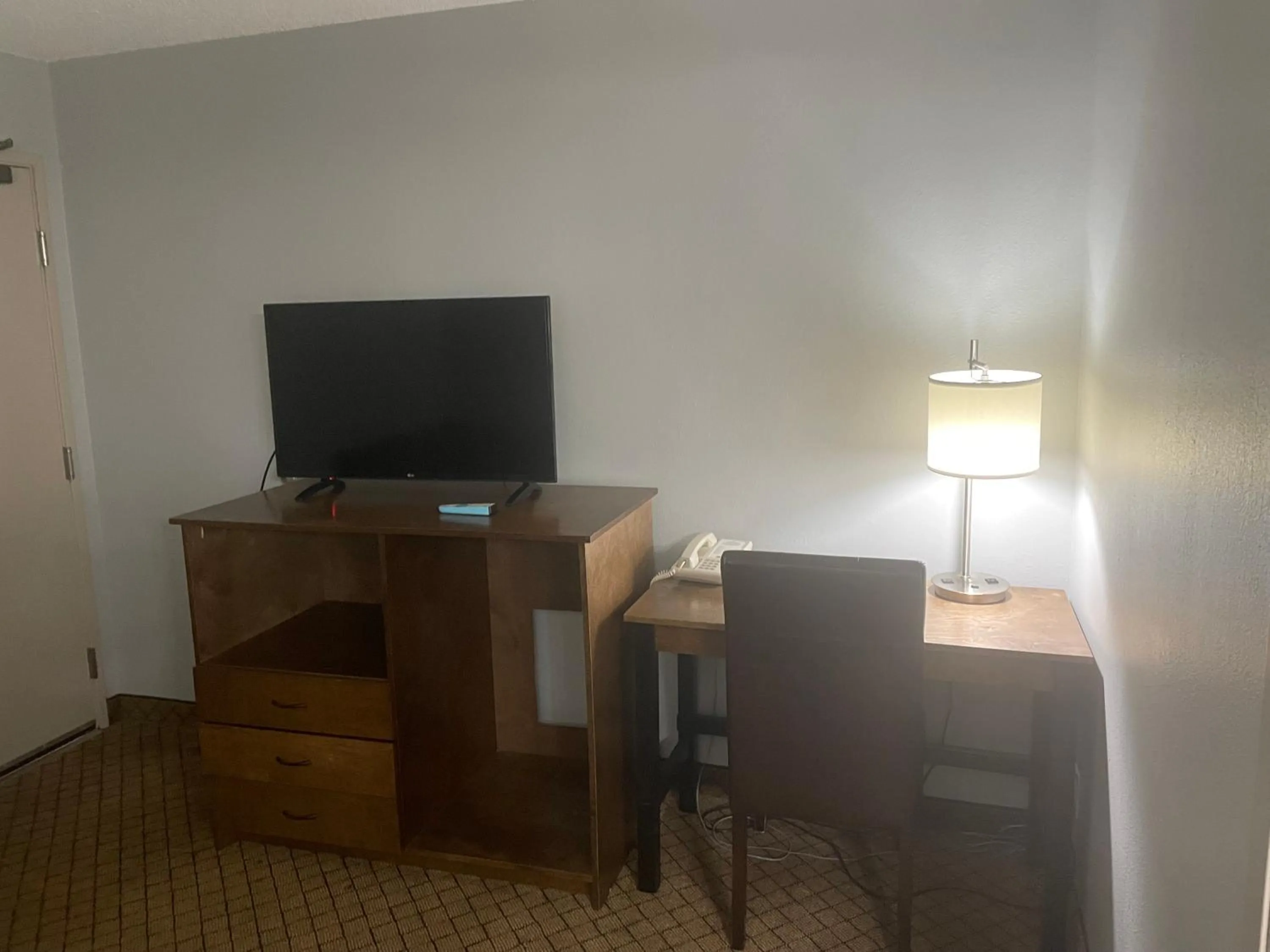 TV and multimedia in AmericInn by Wyndham Hartford WI