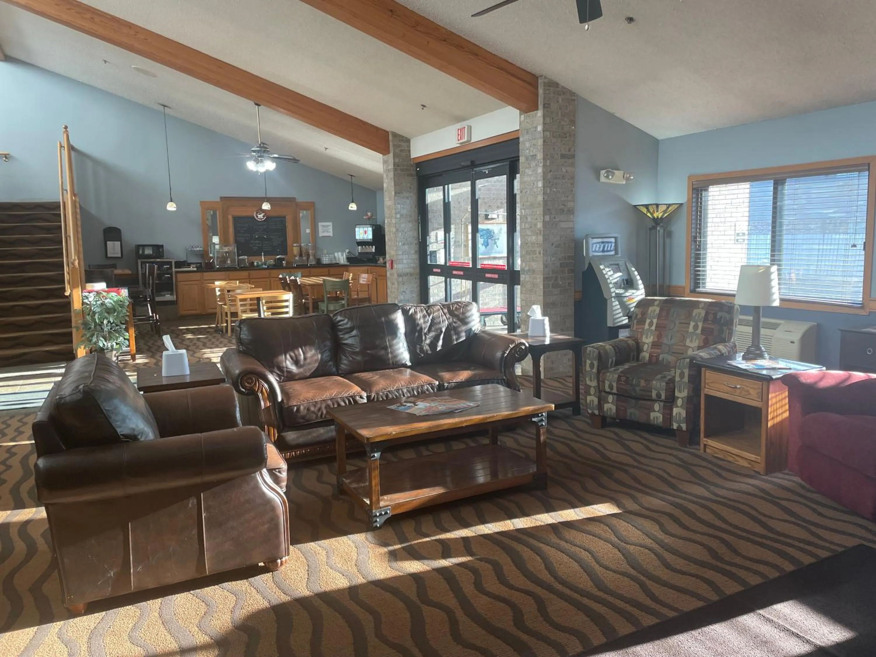 Lobby or reception in AmericInn by Wyndham Hartford WI