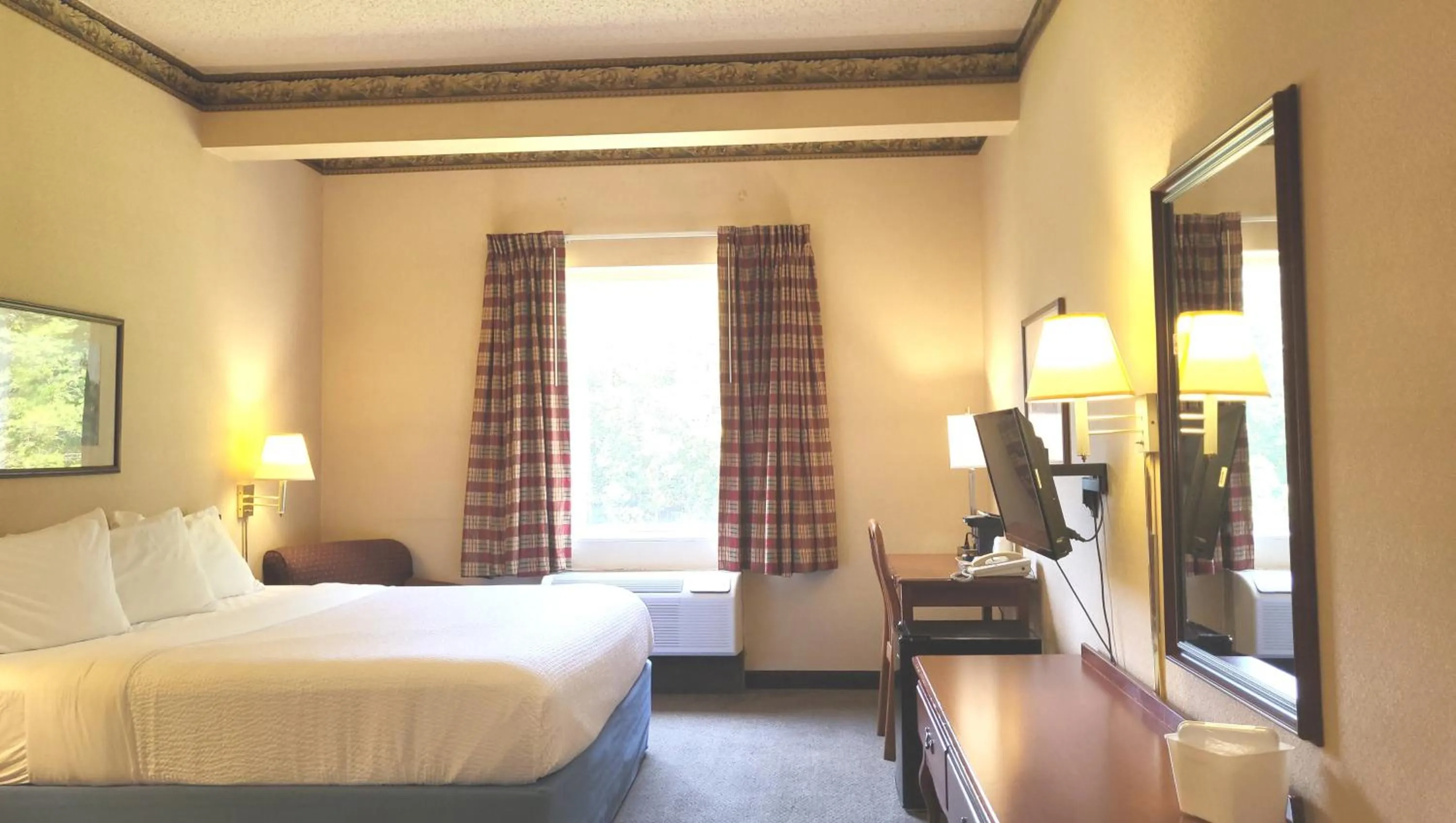 Photo of the whole room, Bed in Magnuson Hotel West Liberty