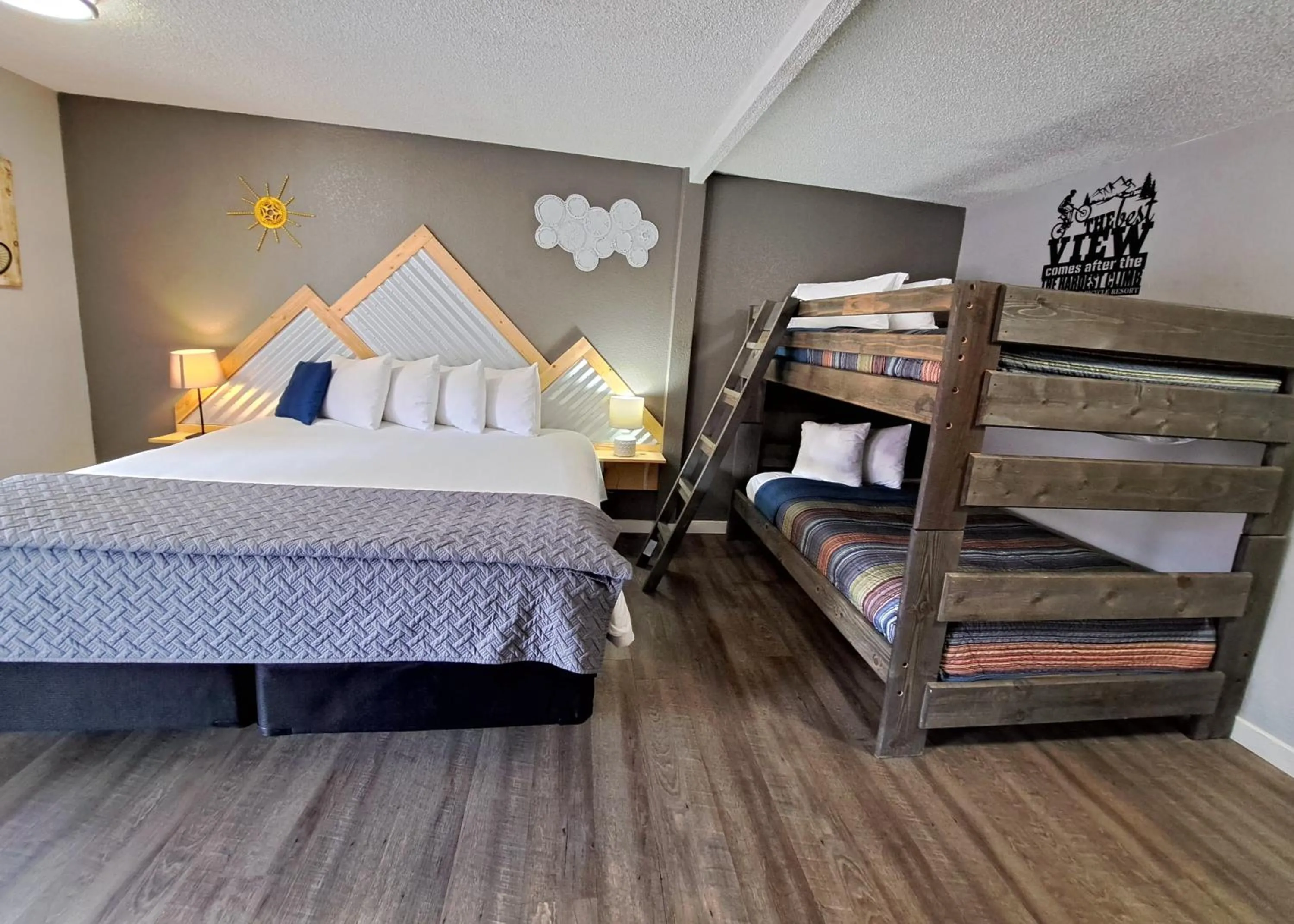 Bedroom, Bed in Buffalo Lodge Bicycle Resort - Amazing access to local trails & the Garden