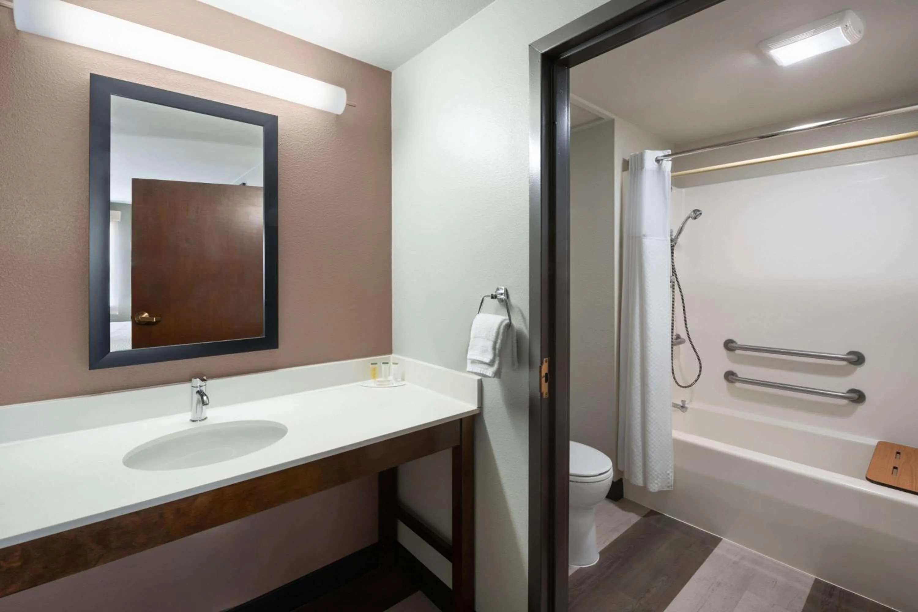 Bathroom in Super 8 by Wyndham Conrad
