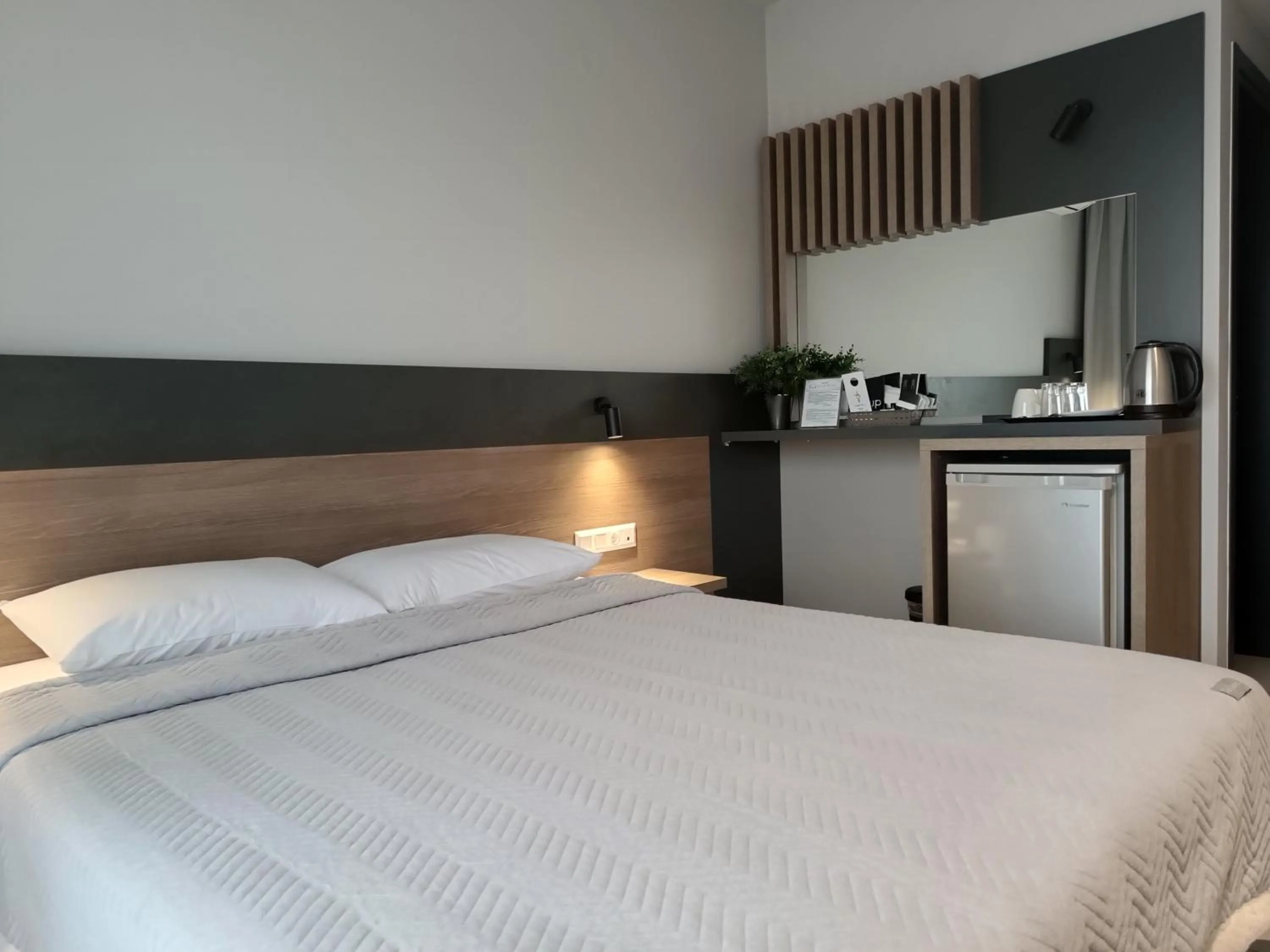 Bed in Elizabeth Queen Luxury Rooms