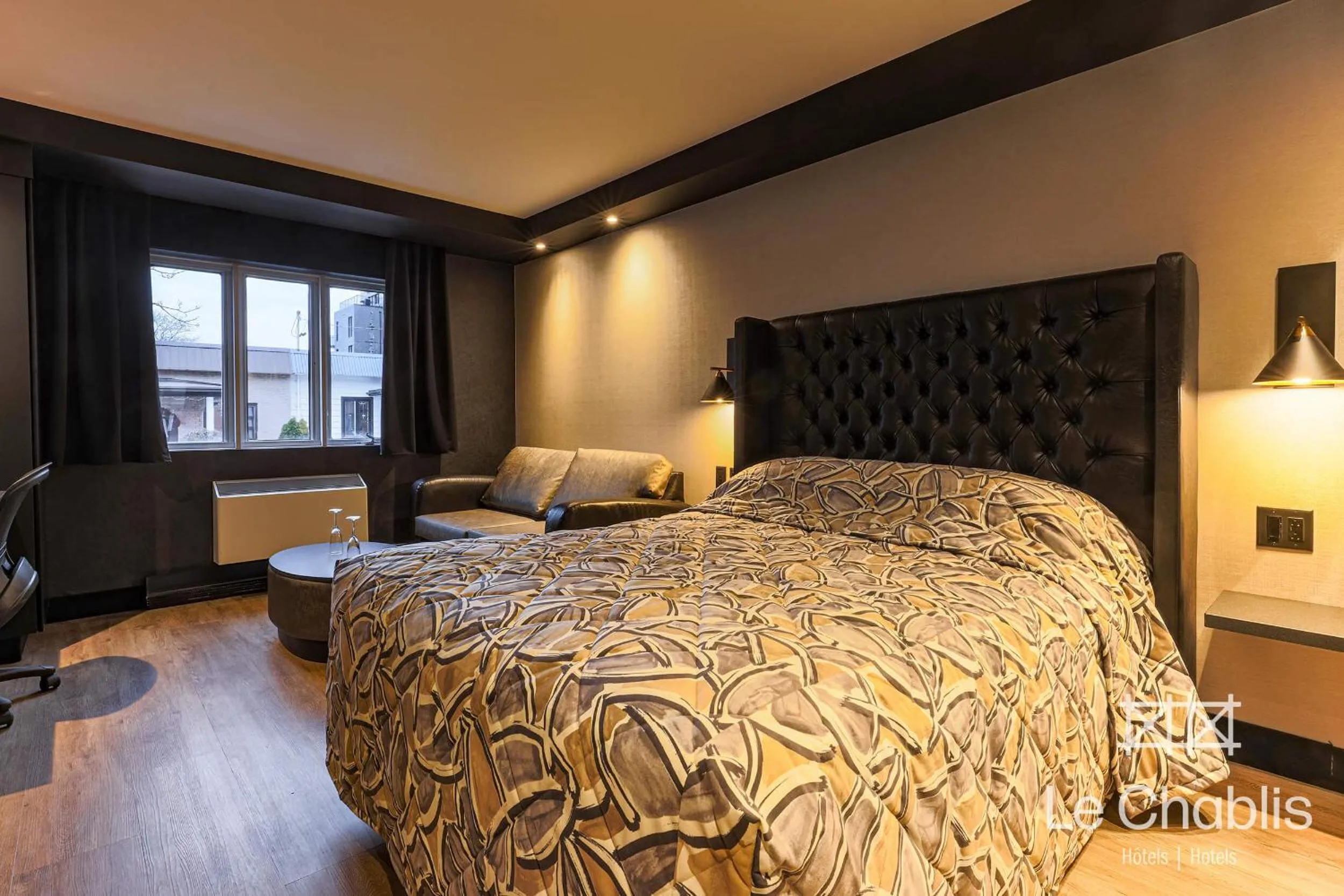 Bed in Hotel Le Chablis Cadillac