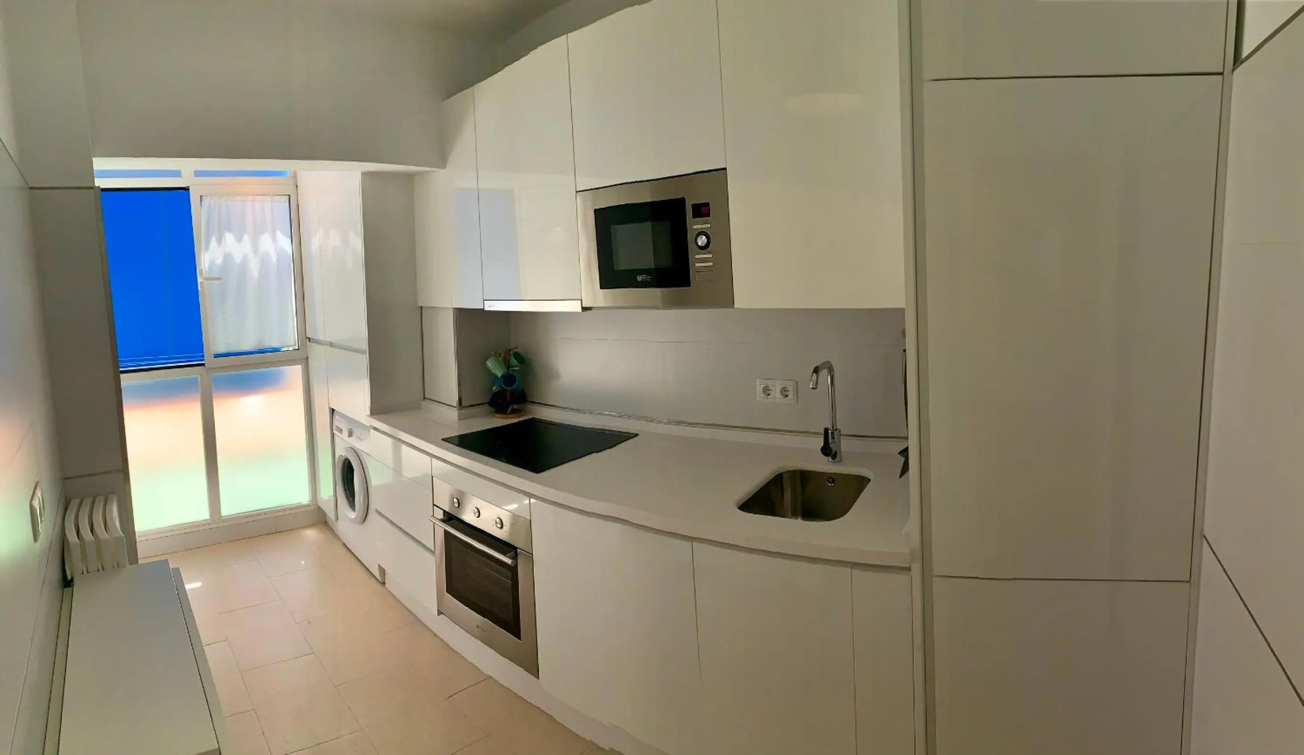 Kitchen or kitchenette in AYAMONTE Deluxe