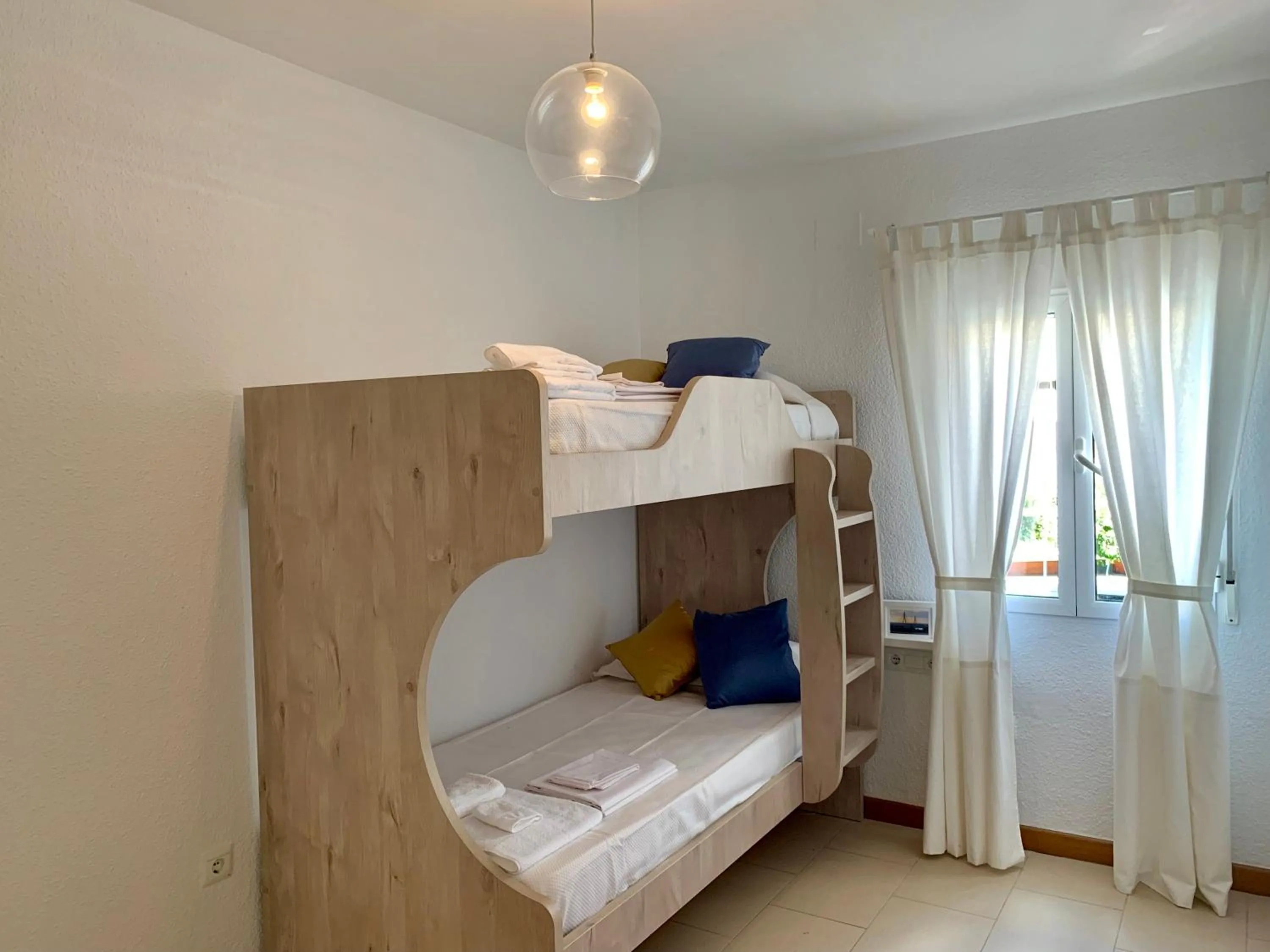 Bed in AYAMONTE Deluxe