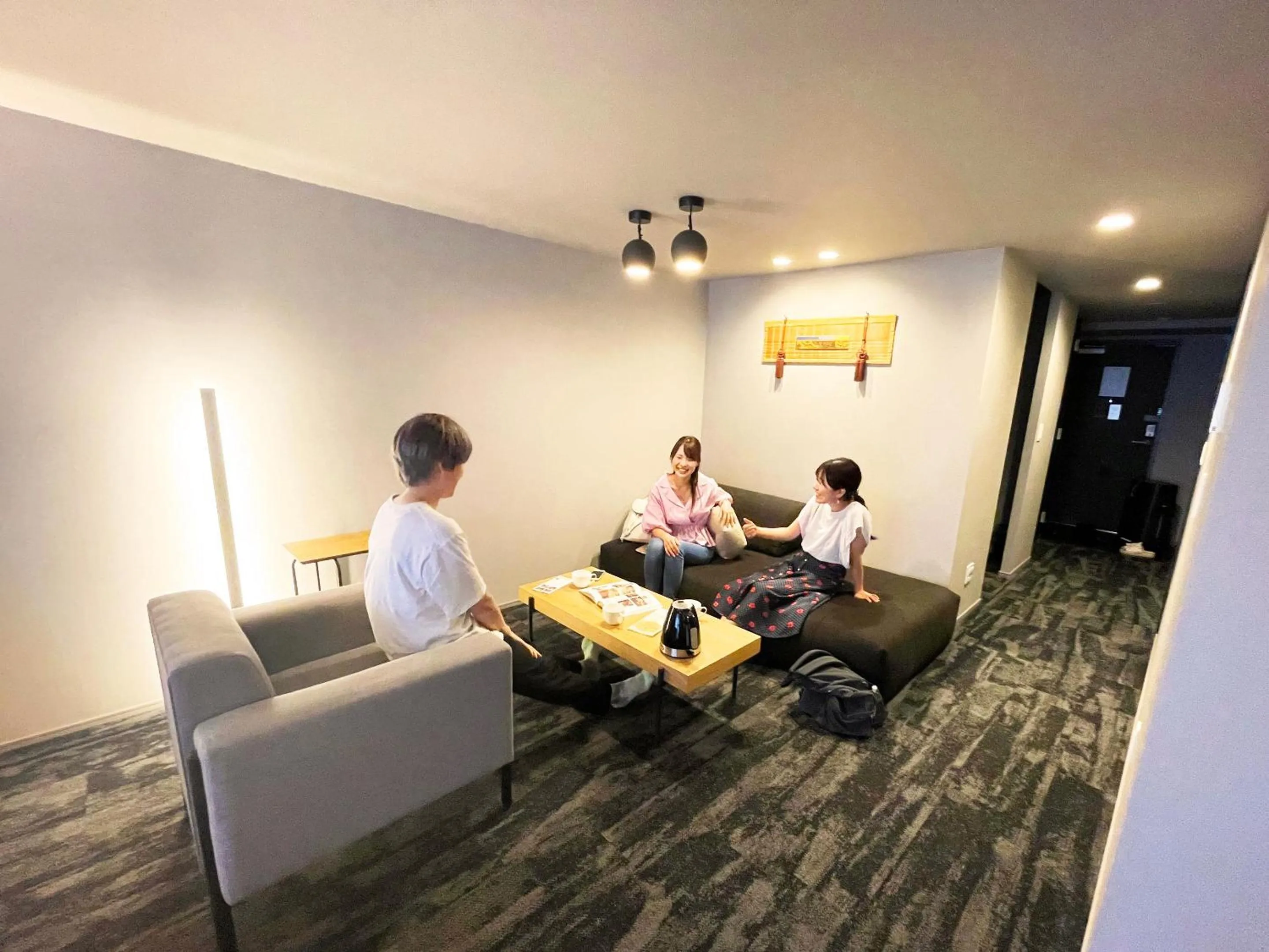 People in RESI STAY Mayu Grace Hotel