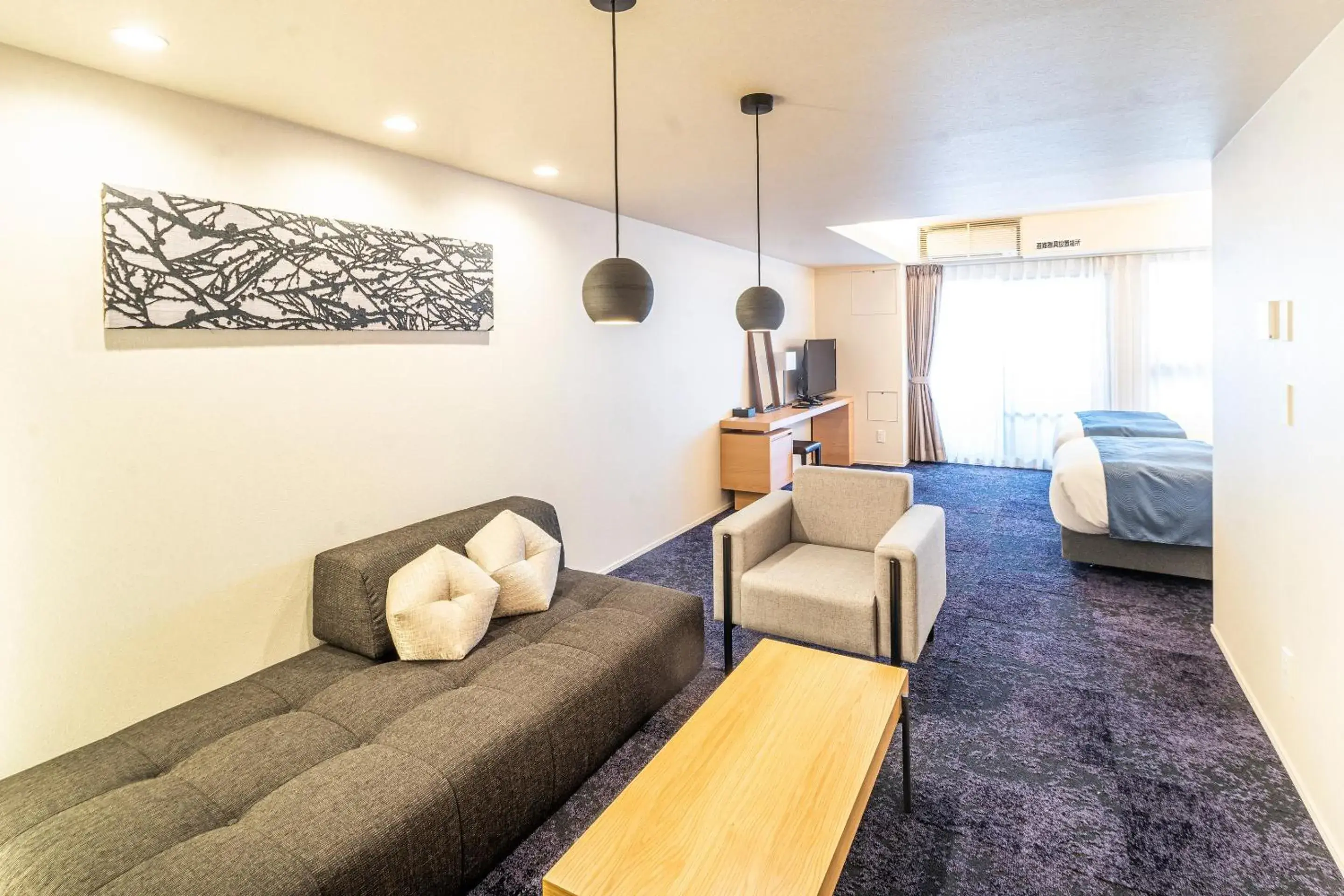 Living room in RESl STAY Mayu Grace Hotel Living room in RESl STAY Mayu Grace Hotel