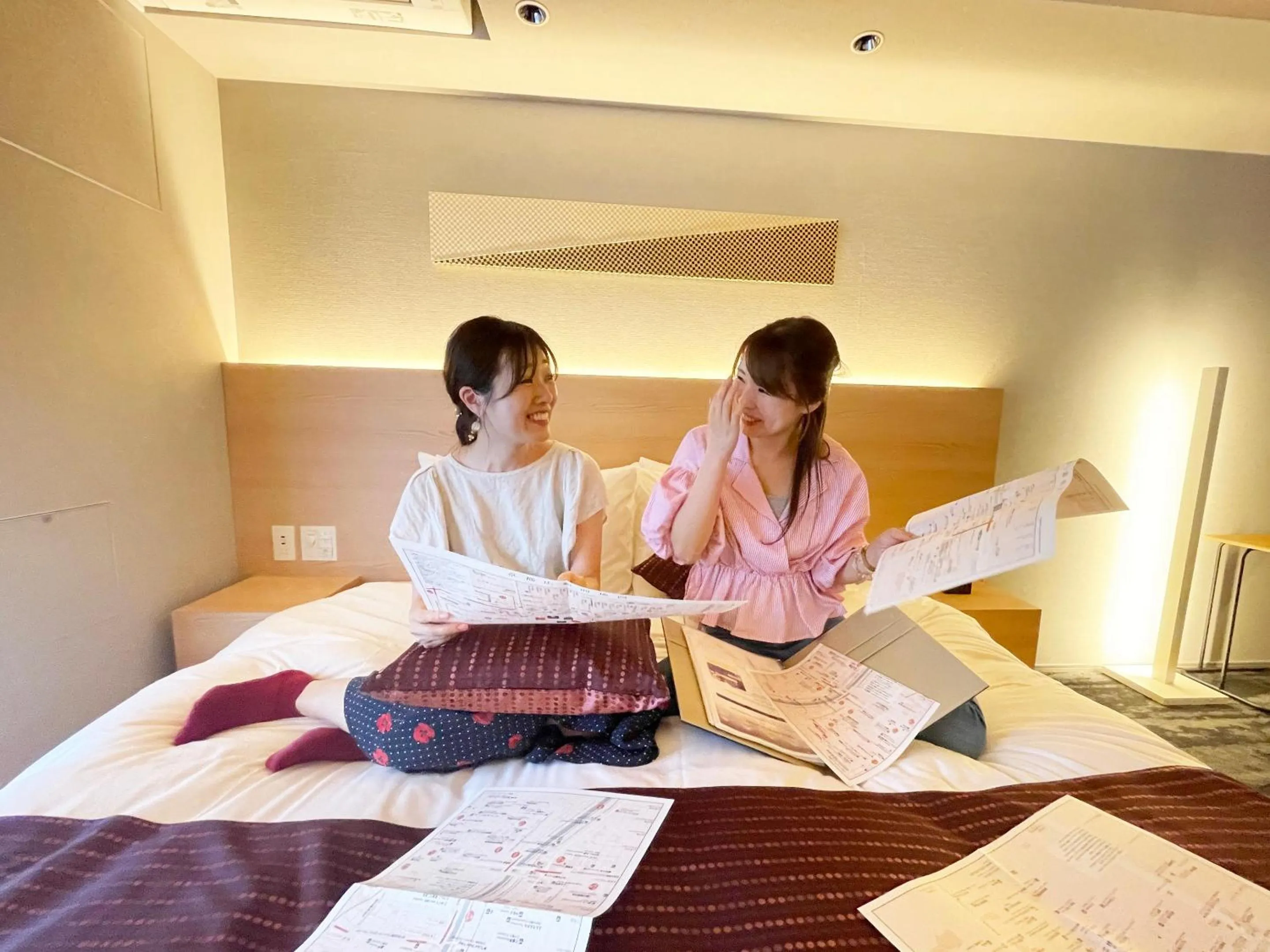 People, Bed in RESI STAY Mayu Grace Hotel