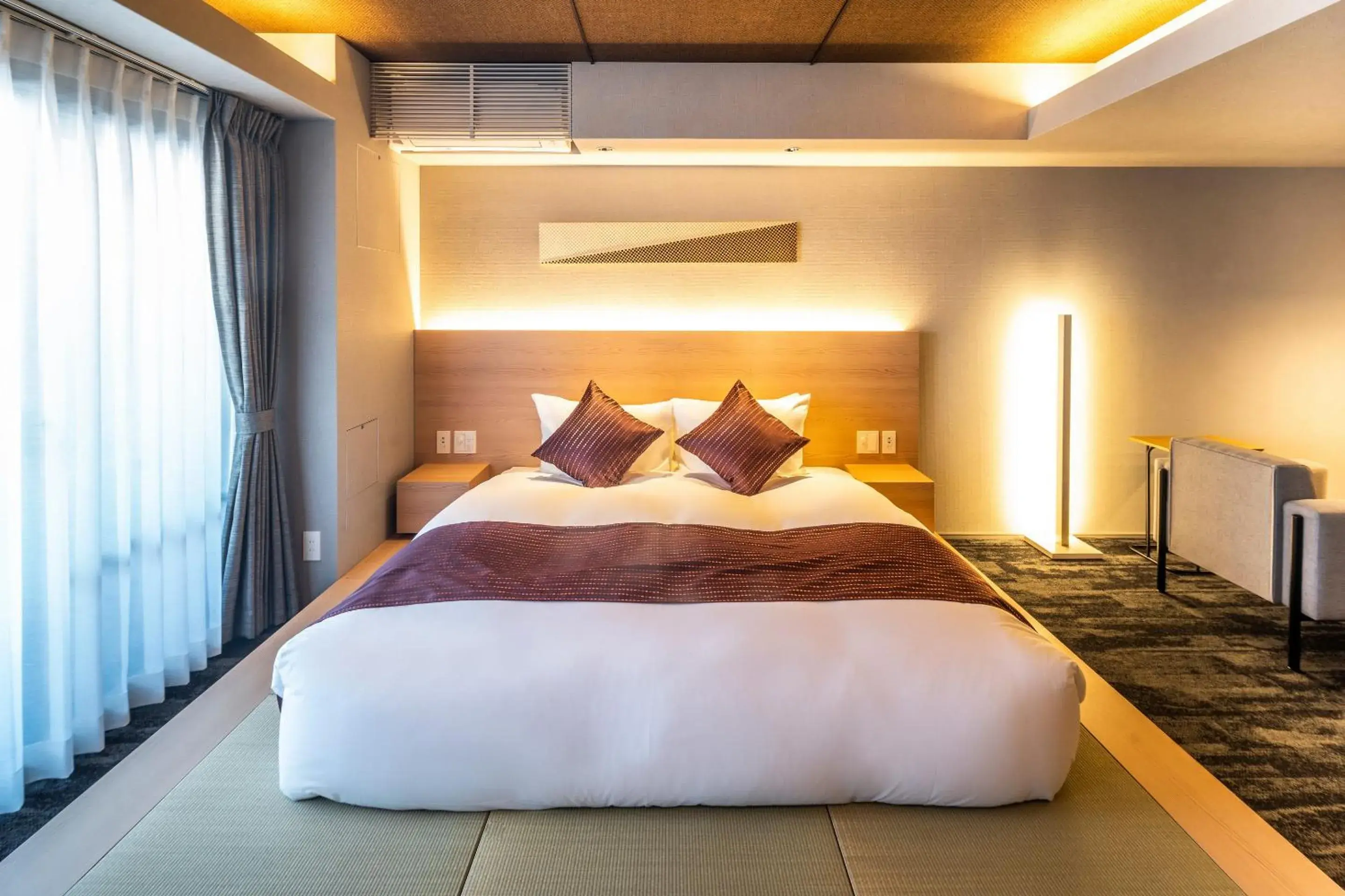 Bed in RESl STAY Mayu Grace Hotel Bed in RESl STAY Mayu Grace Hotel