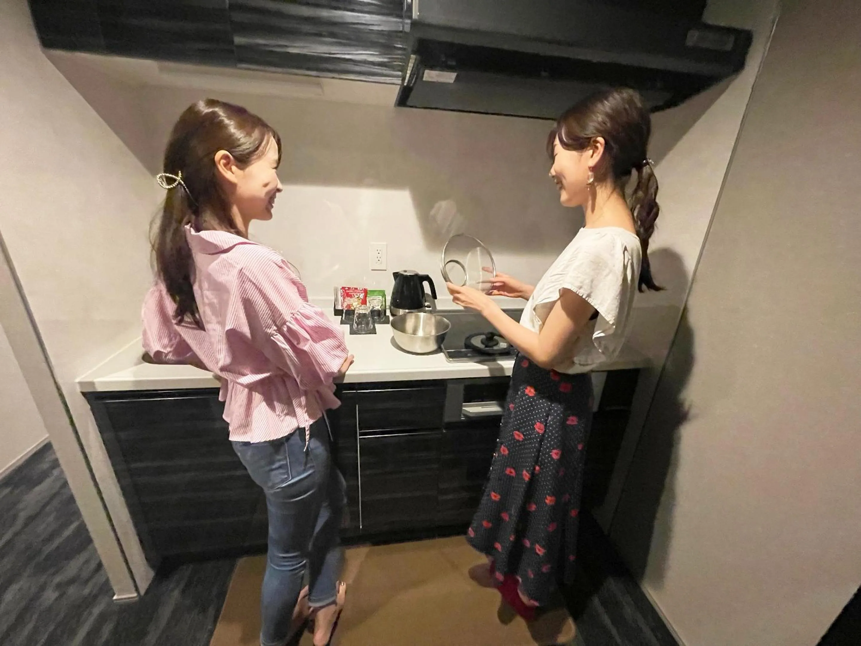 Kitchen or kitchenette in RESI STAY Mayu Grace Hotel