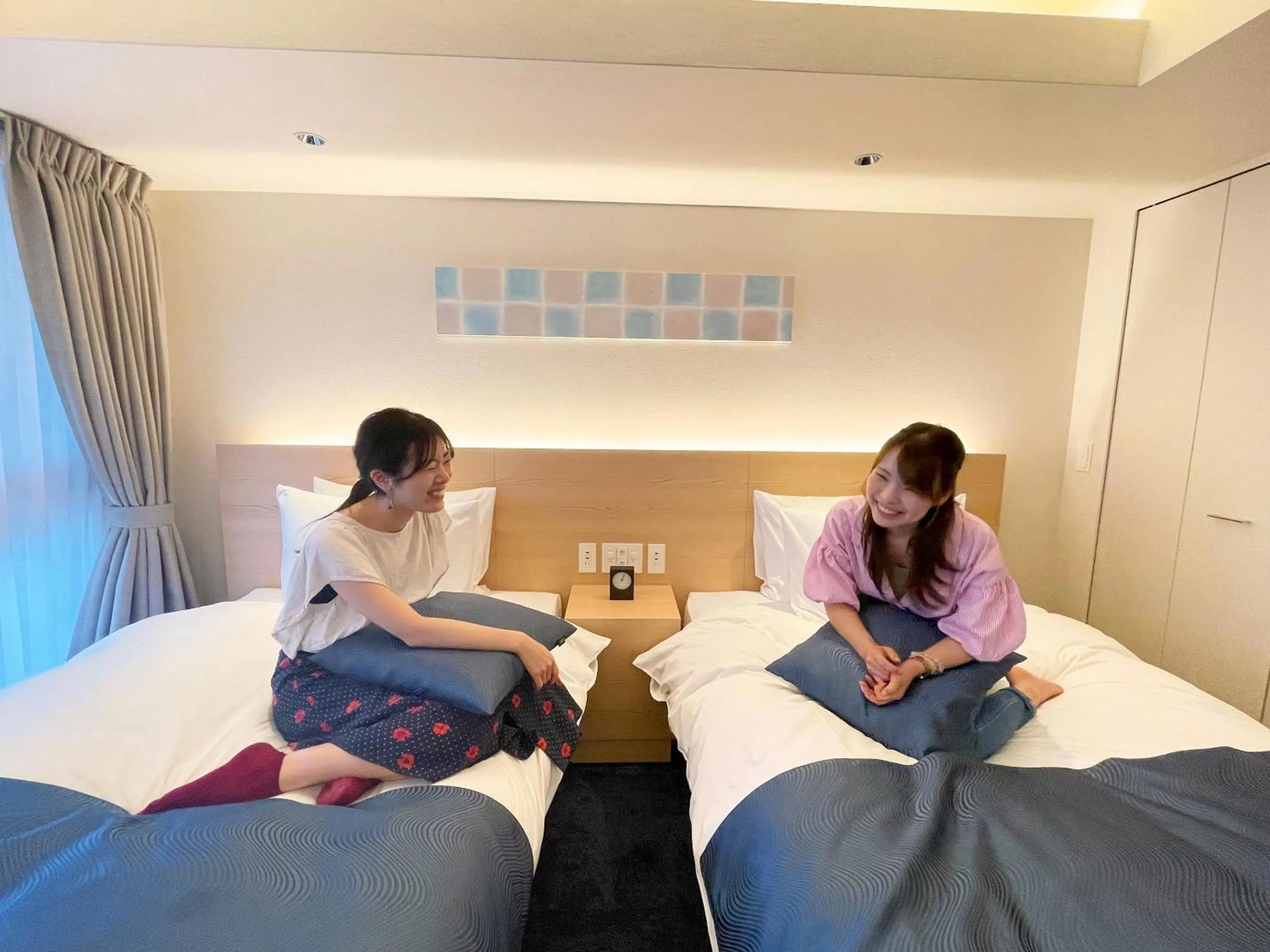 People, Bed in RESI STAY Mayu Grace Hotel