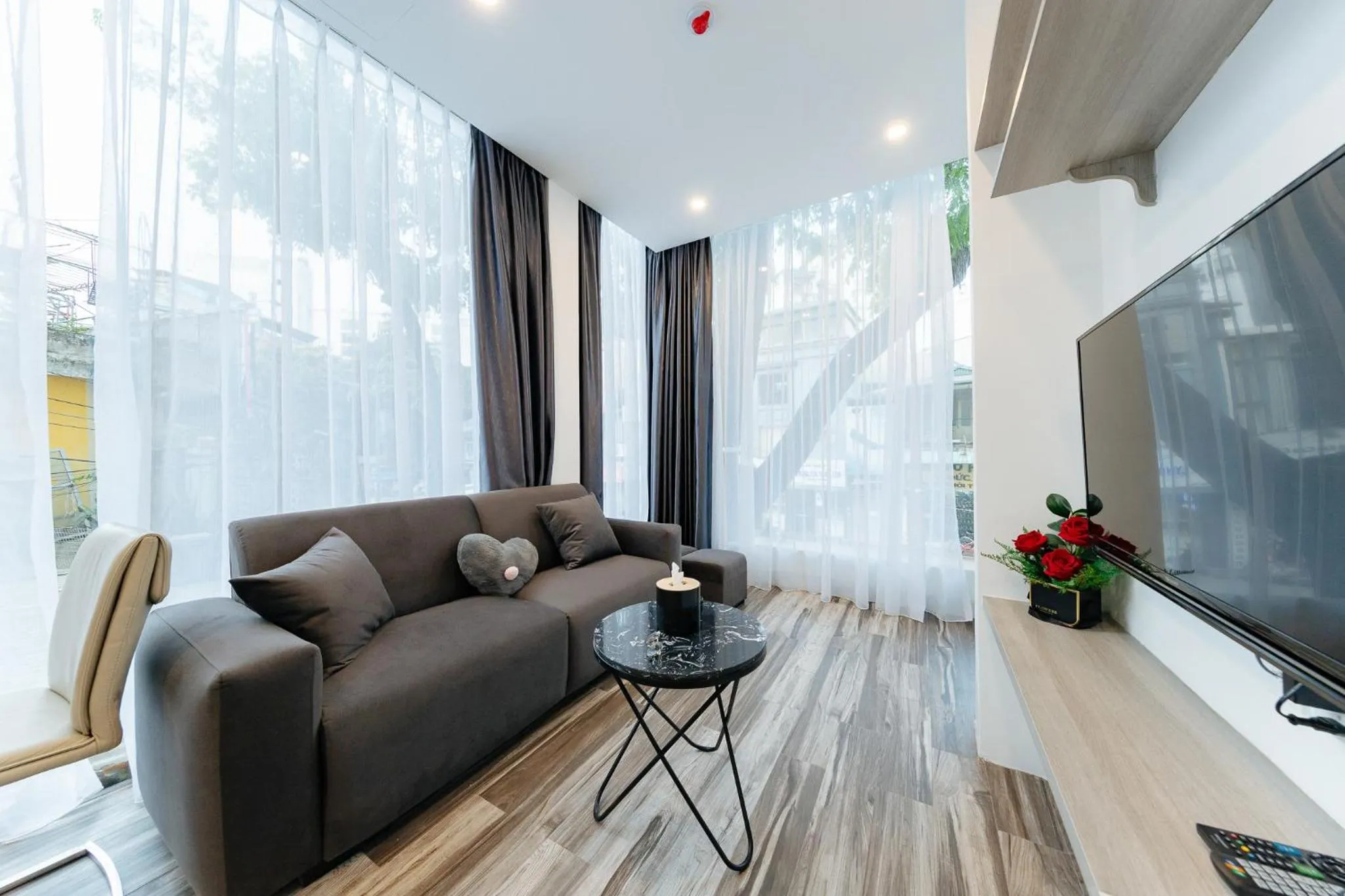 Living room in Su Casa Hanoi Old Quarter