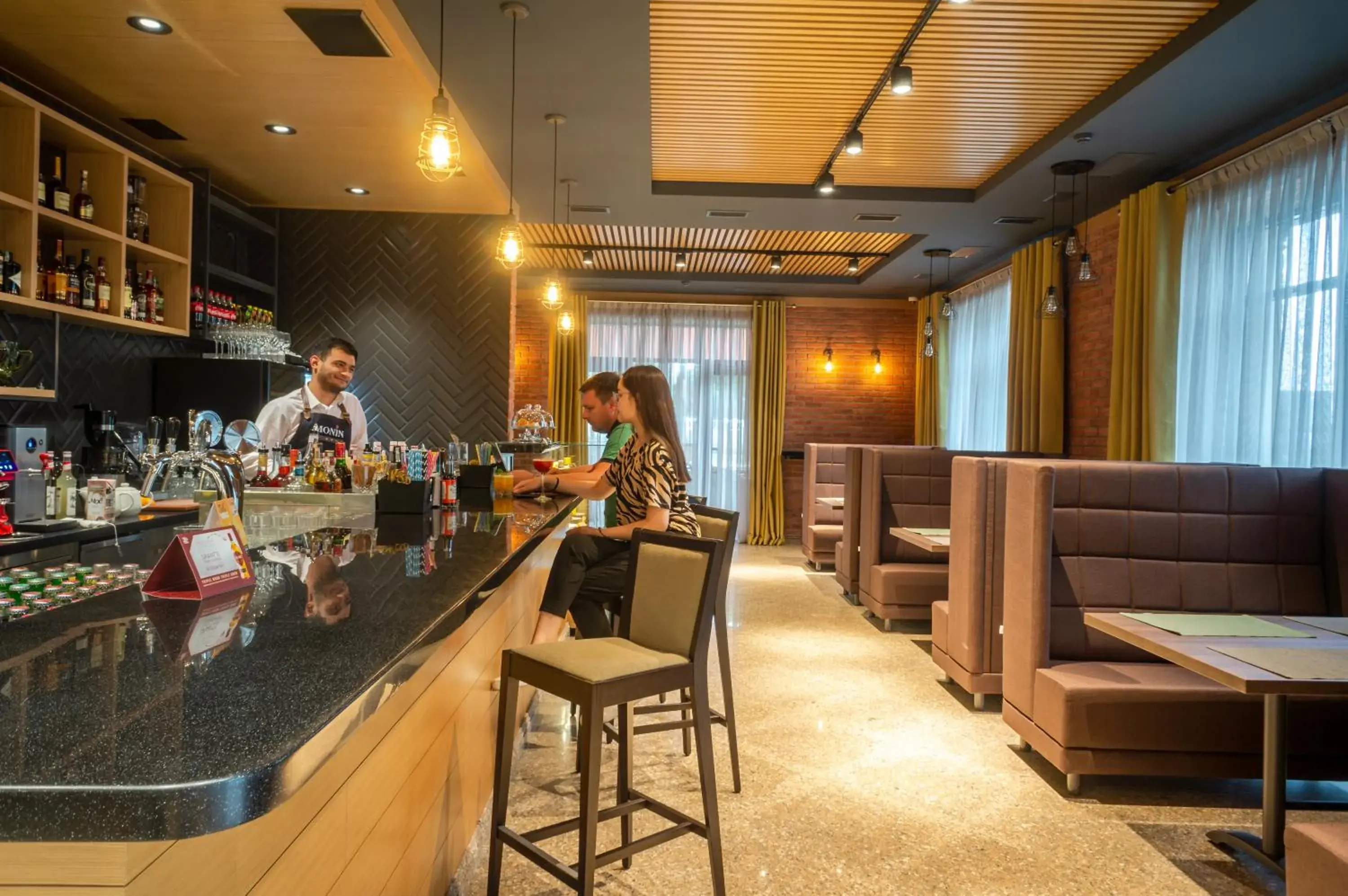 Lounge or bar in Royal Plus Hotel Lounge or bar in Royal Plus Hotel