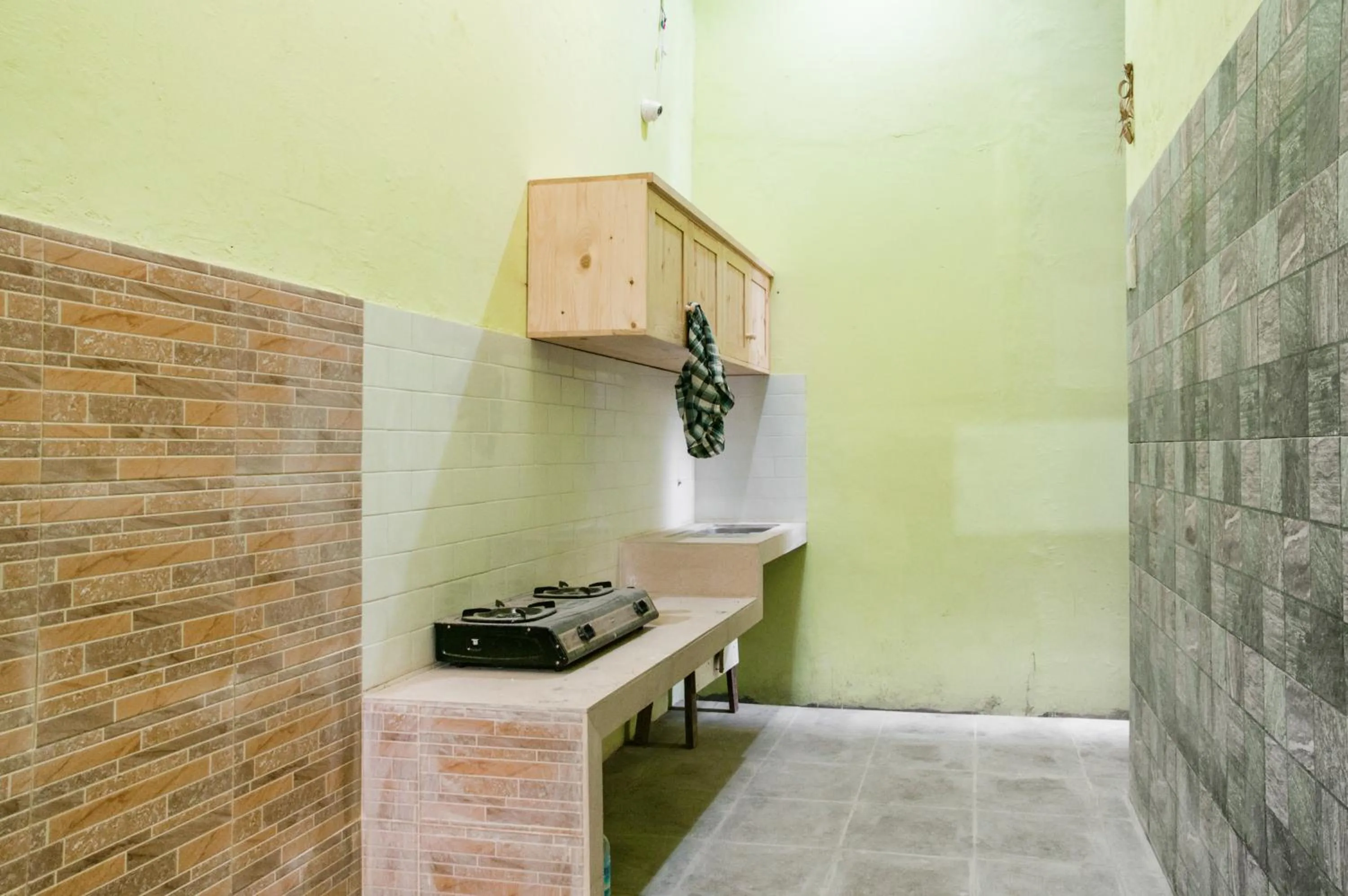 Kitchen or kitchenette in RedDoorz @ Panglima Polim 2