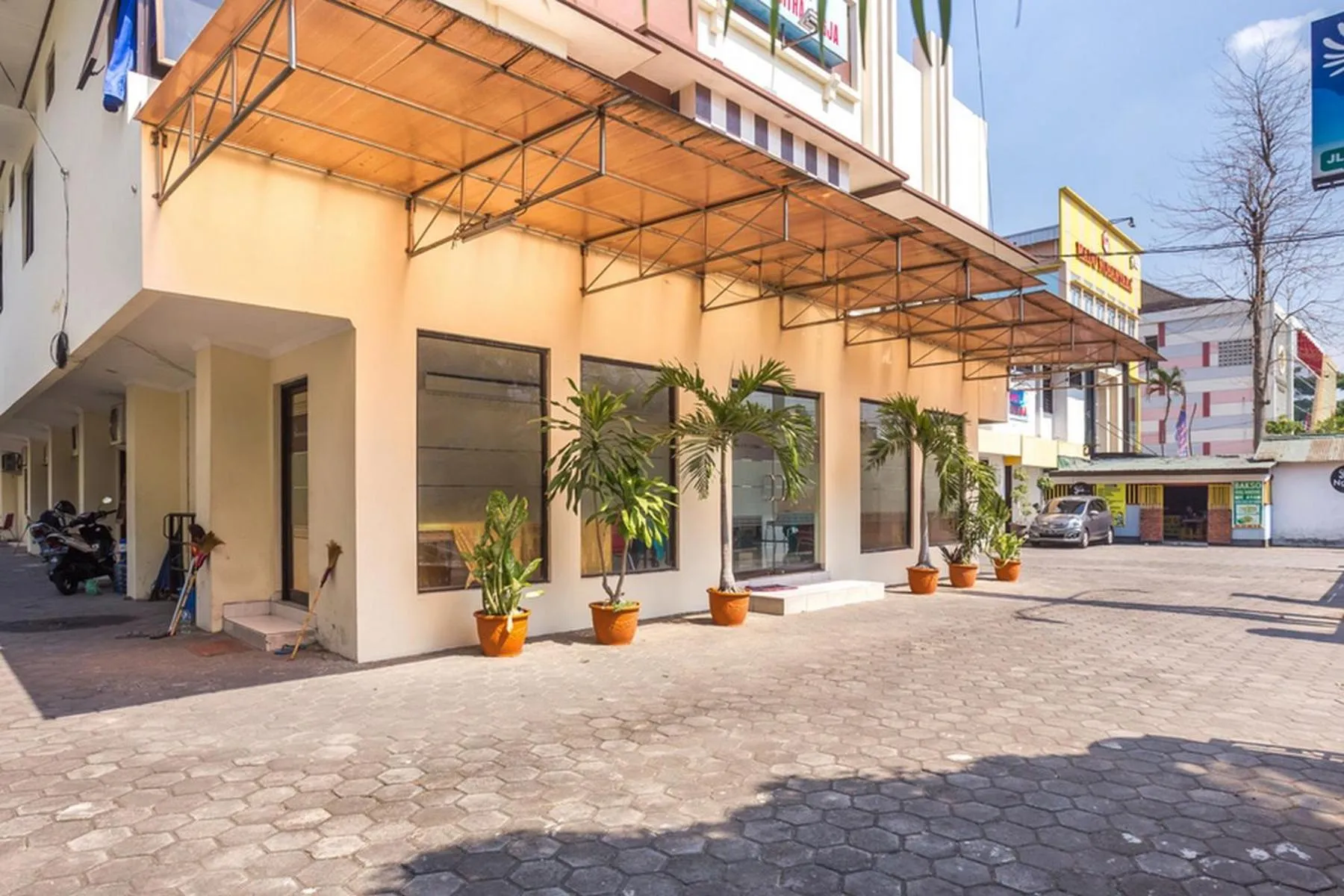 Property logo or sign in RedDoorz near XT Square 2